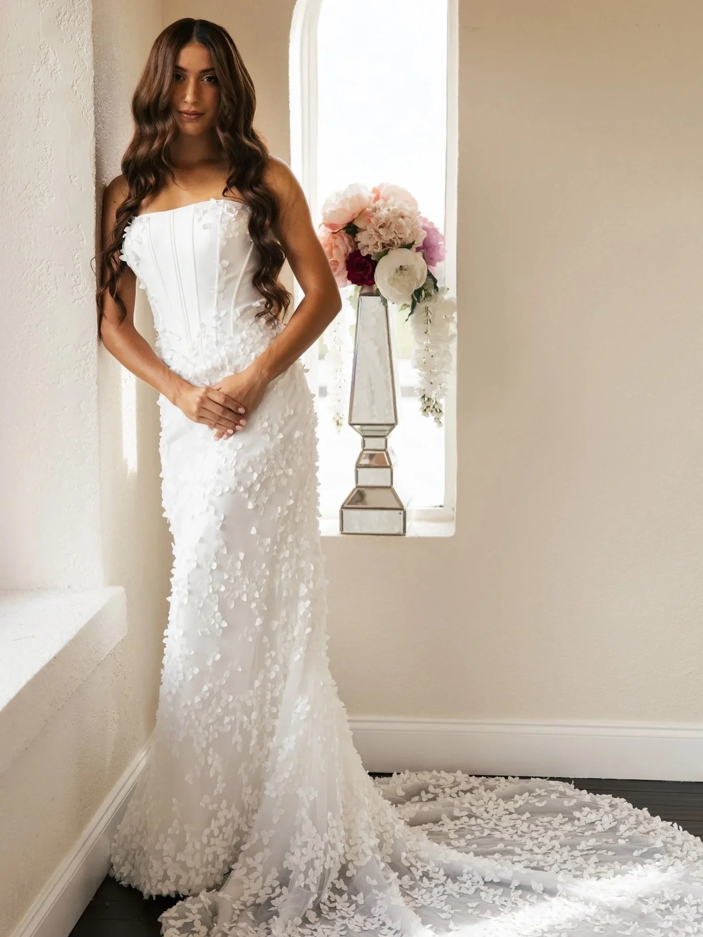 Got it, that&rsquo;s a helpful note. Here&rsquo;s the revised version without the em dash:

Structured, sculpted, and just a little unexpected.

A clean, straight neckline meets a fitted corset bodice for that modern, figure-skimming shape, then soft