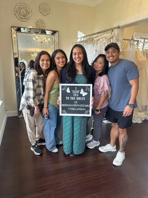 Karina saying yes to her wedding dress at Bridal Gown Studio Orlando