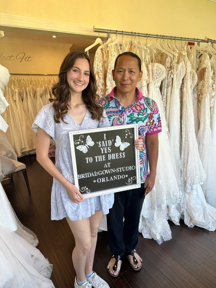 Ally saying yes to her wedding dress at Bridal Gown Studio Orlando