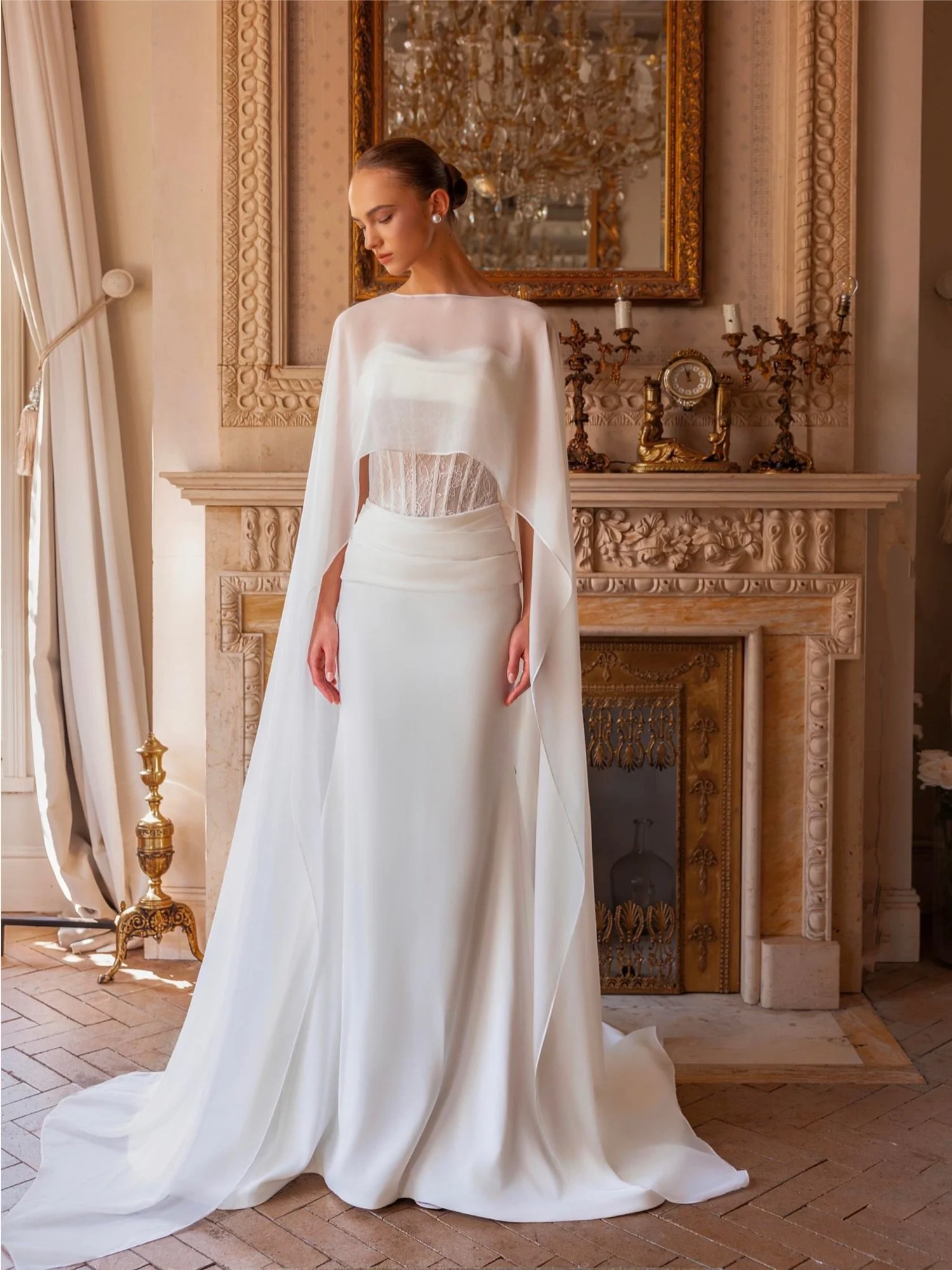 A sheer lace corset, delicate eyelash lace detailing, and a softly draped chiffon skirt&hellip; what more could a bride ask for? 🤍
Complete the look with a matching chiffon cape for an effortlessly romantic bridal moment.