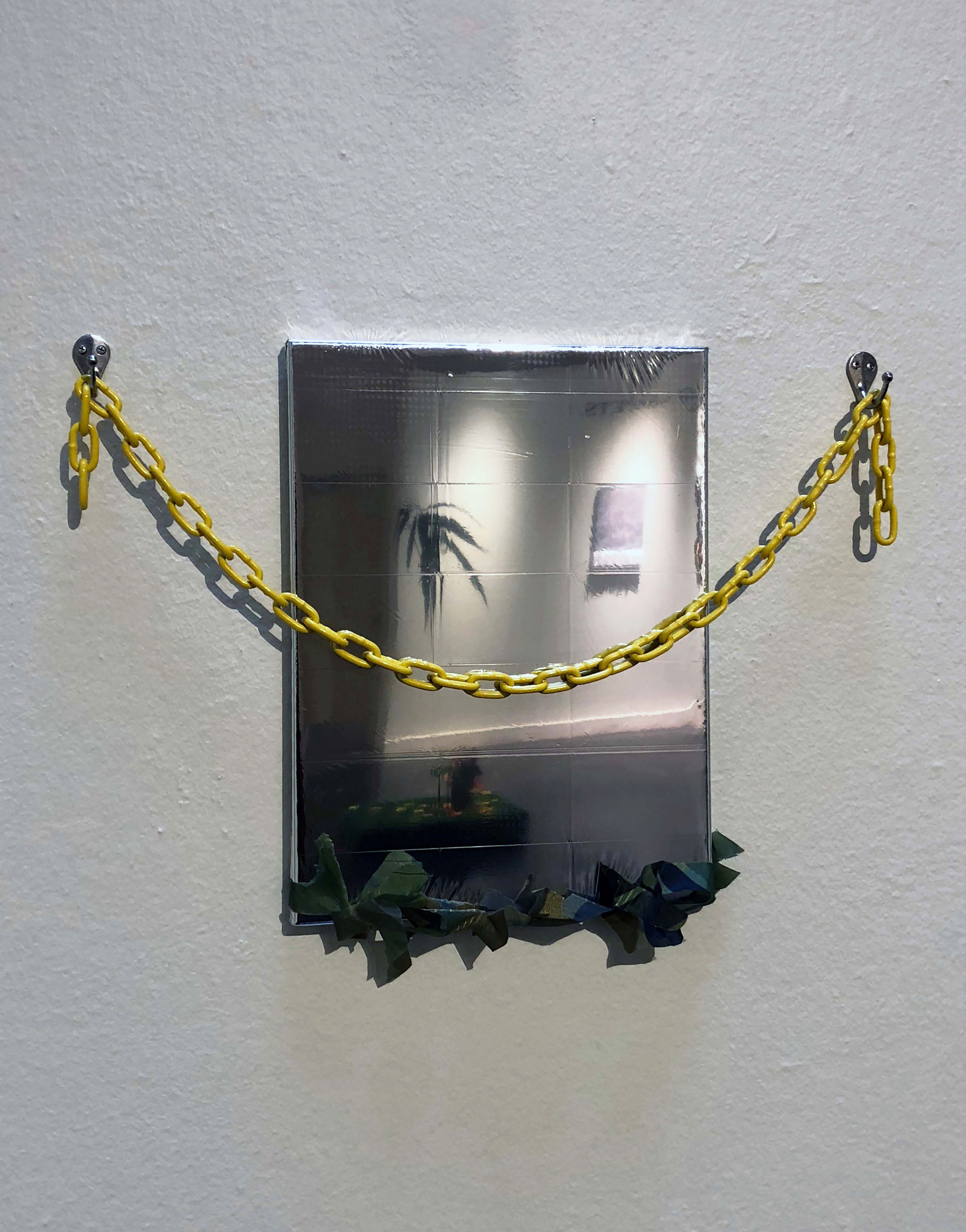 Erick A Benitez_Will o' the Wisp_ Camoflauge net mounted on streched thermal mylar and steel chain_2018_$1,200.jpg