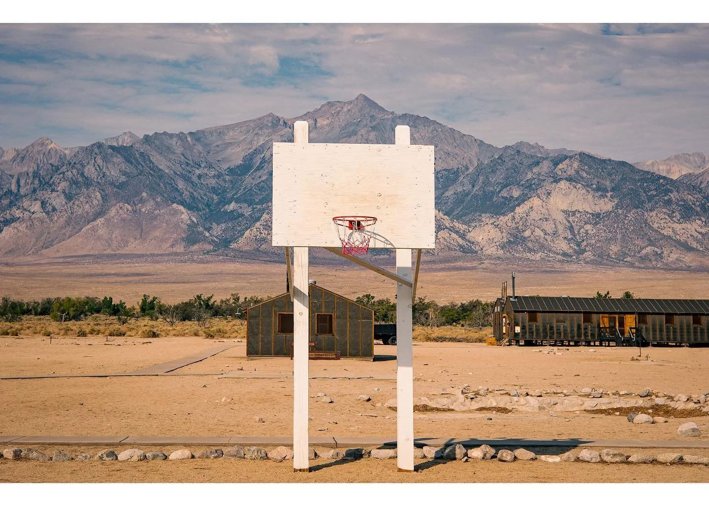 Facing Mount Whitney and the Sierras to the west, and Death Valley to the east. 

The basketball court at Manzanar, one of ten Japanese incarceration camps in the western United States, stands where it stood 80 years ago today. 

Shoutout to @thefran