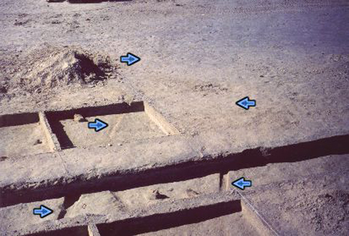 22. Made 11/5/86, Great Salt Lake Desert, Utah. Sharp, 140 Year-Old Wagon Ruts. Photograph: Copyright © 1986 Roy D. Tea. Archeological excavation of another wagon mound by the Silver Island Expedition. Notice wheel tracks in the mud below the surface and subtle indications of wheel tracks on the surface. It is presumed that in this area the wagon wheels cut through the crust into the softer material below, making hard pulling for the draft animals and leaving deep ruts that filled in over time with the distinct, light-colored gypsum sand the desert winds blow across this flat.