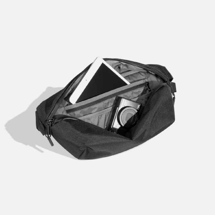 Nice travel slang bag. Very clean. Very Minimal. $60 at Aer .