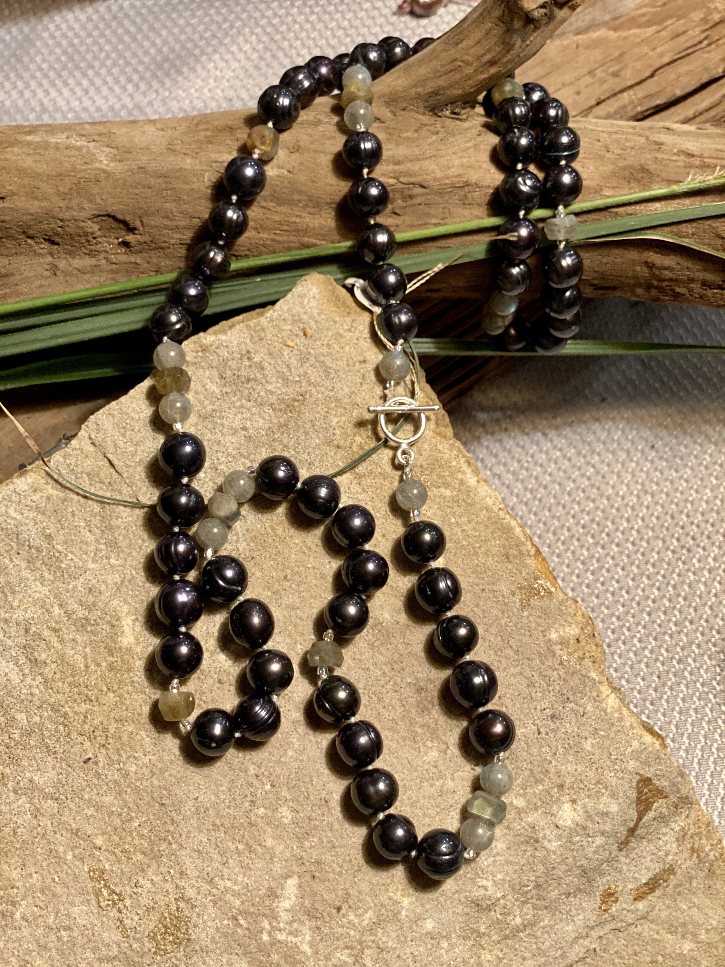 34” irridescent black natural freshwater pearl with  Labrodite beads.