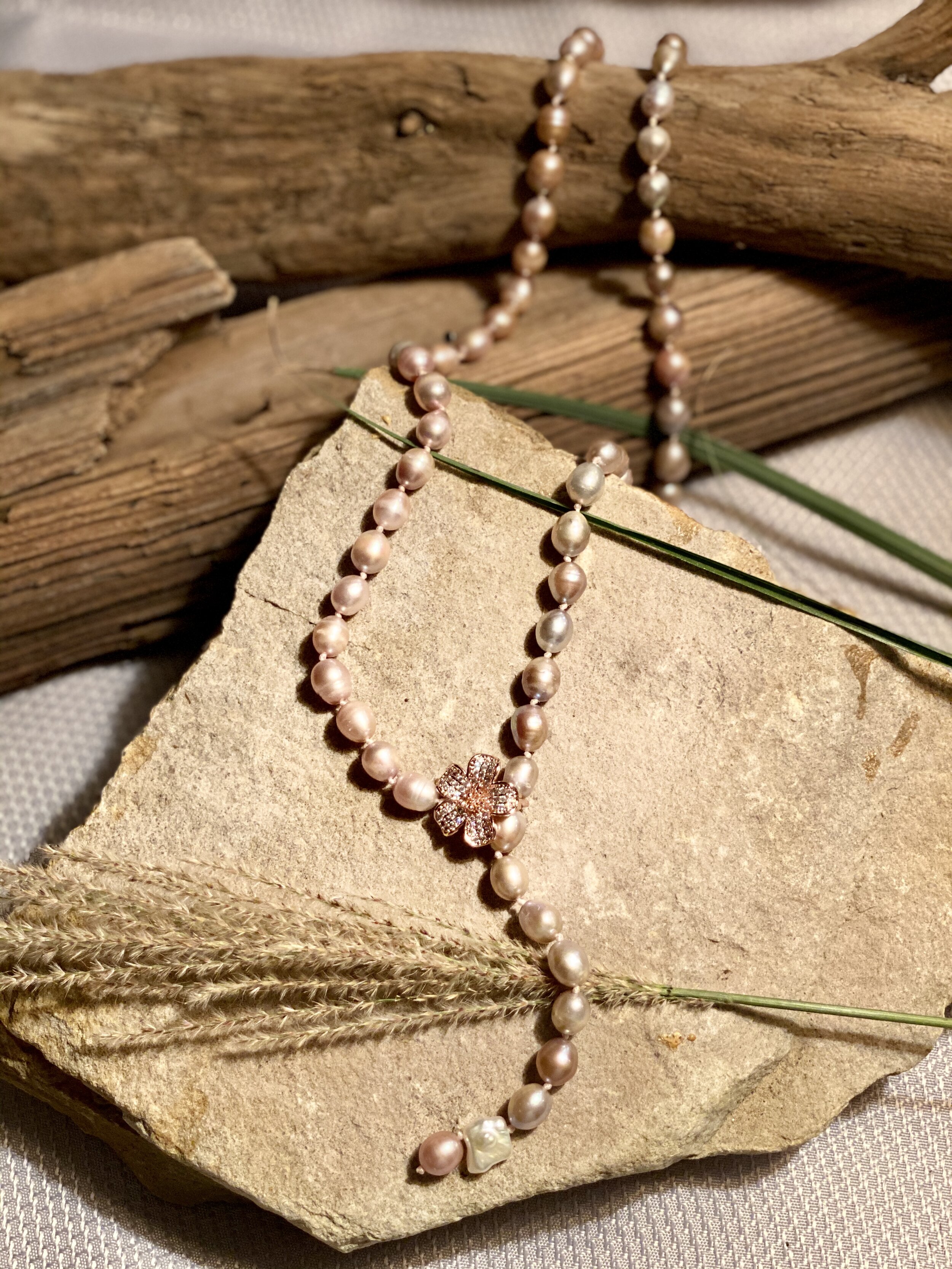 34” natural pink freshwater pearl necklace.