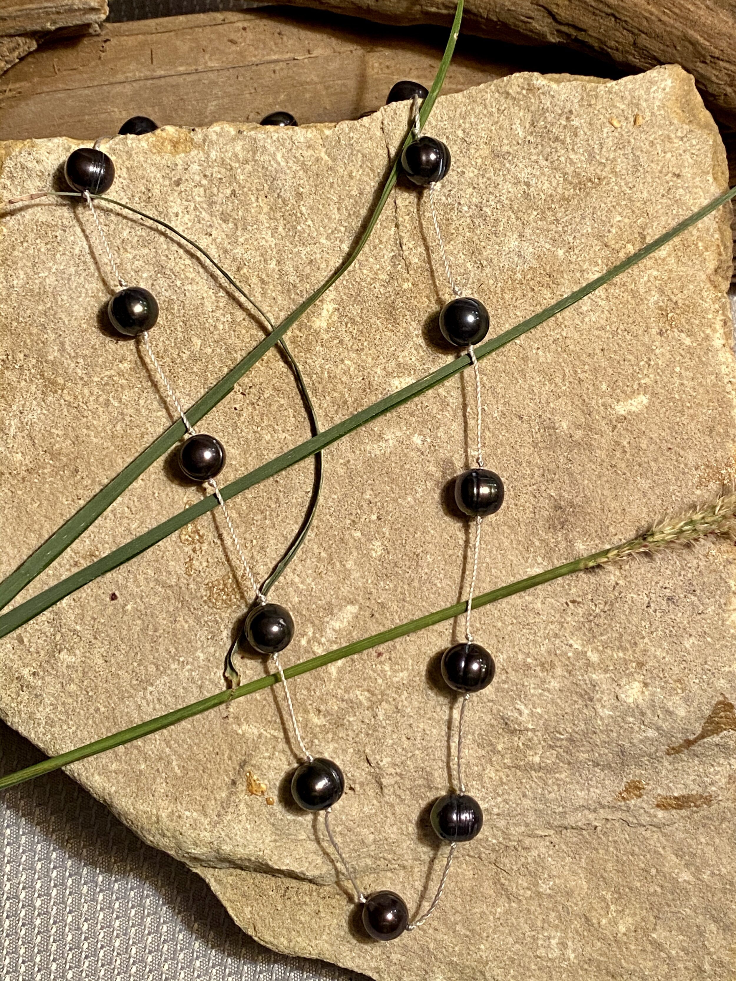 19.5” iridescent black freshwater pearl “Tin cup” style necklace