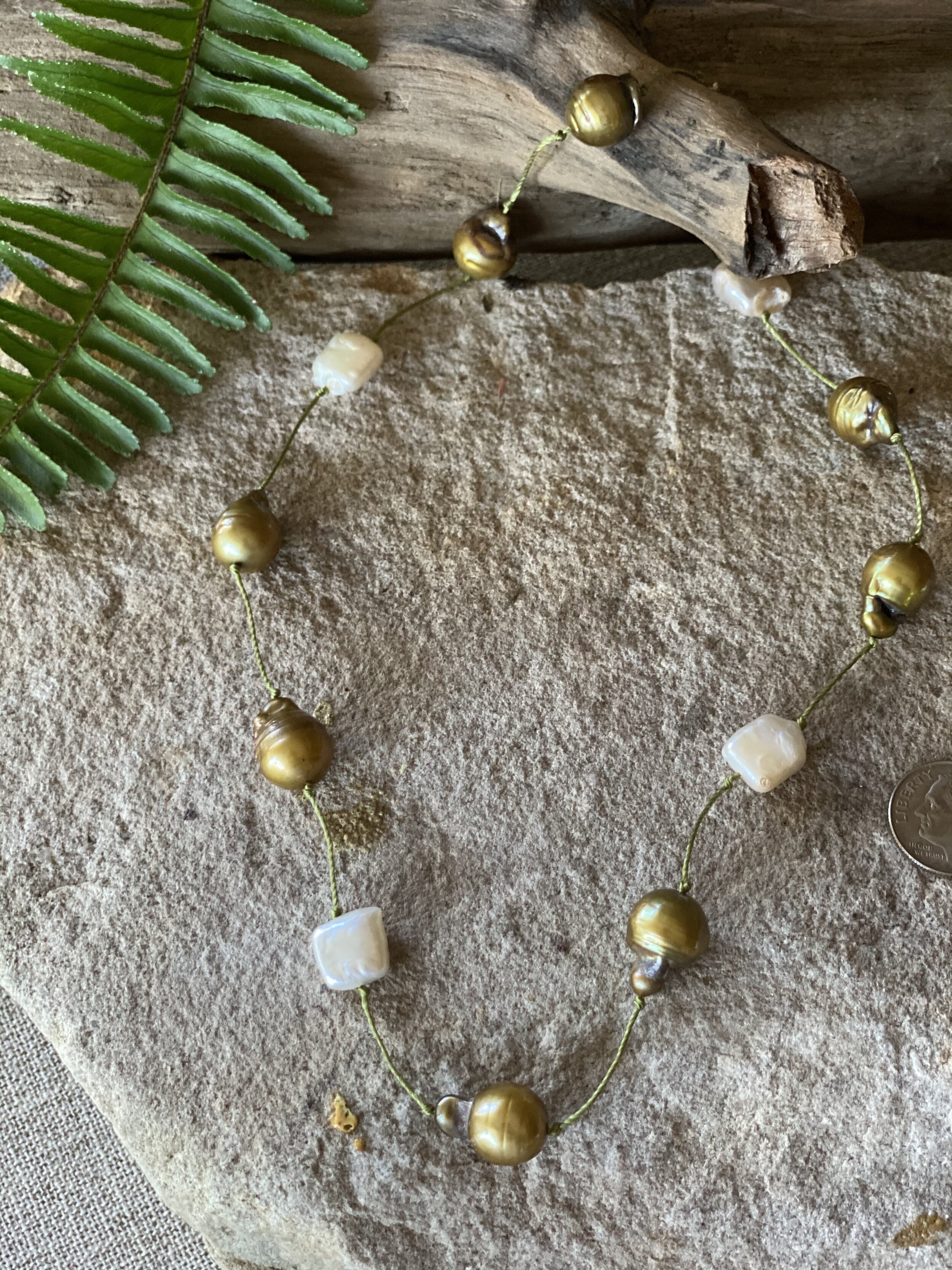 18” natural and gold dyed freshwater “tin cup” style pearl necklace