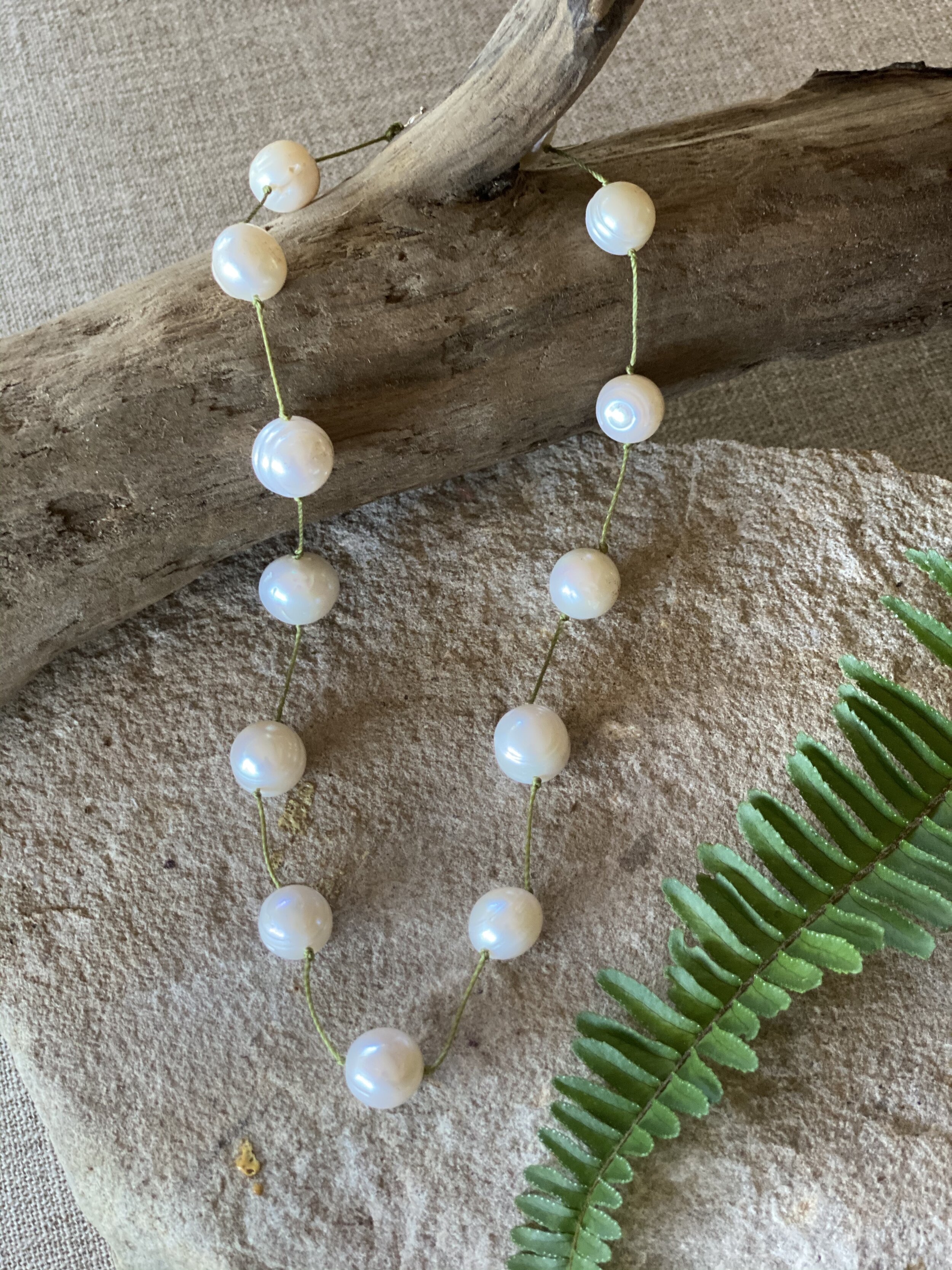 16” large natural freshwater pearl “tin cup” style necklace.