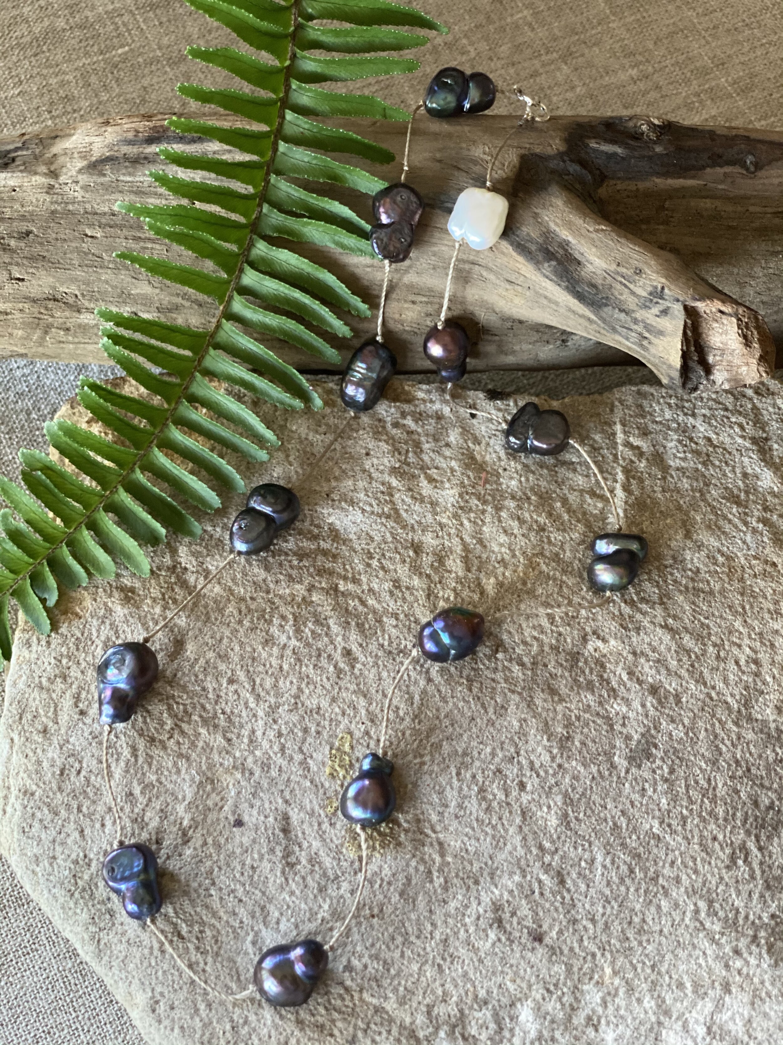 18.5” freshwater peacock colored, peanut shape “tin cup” style pearl necklace 