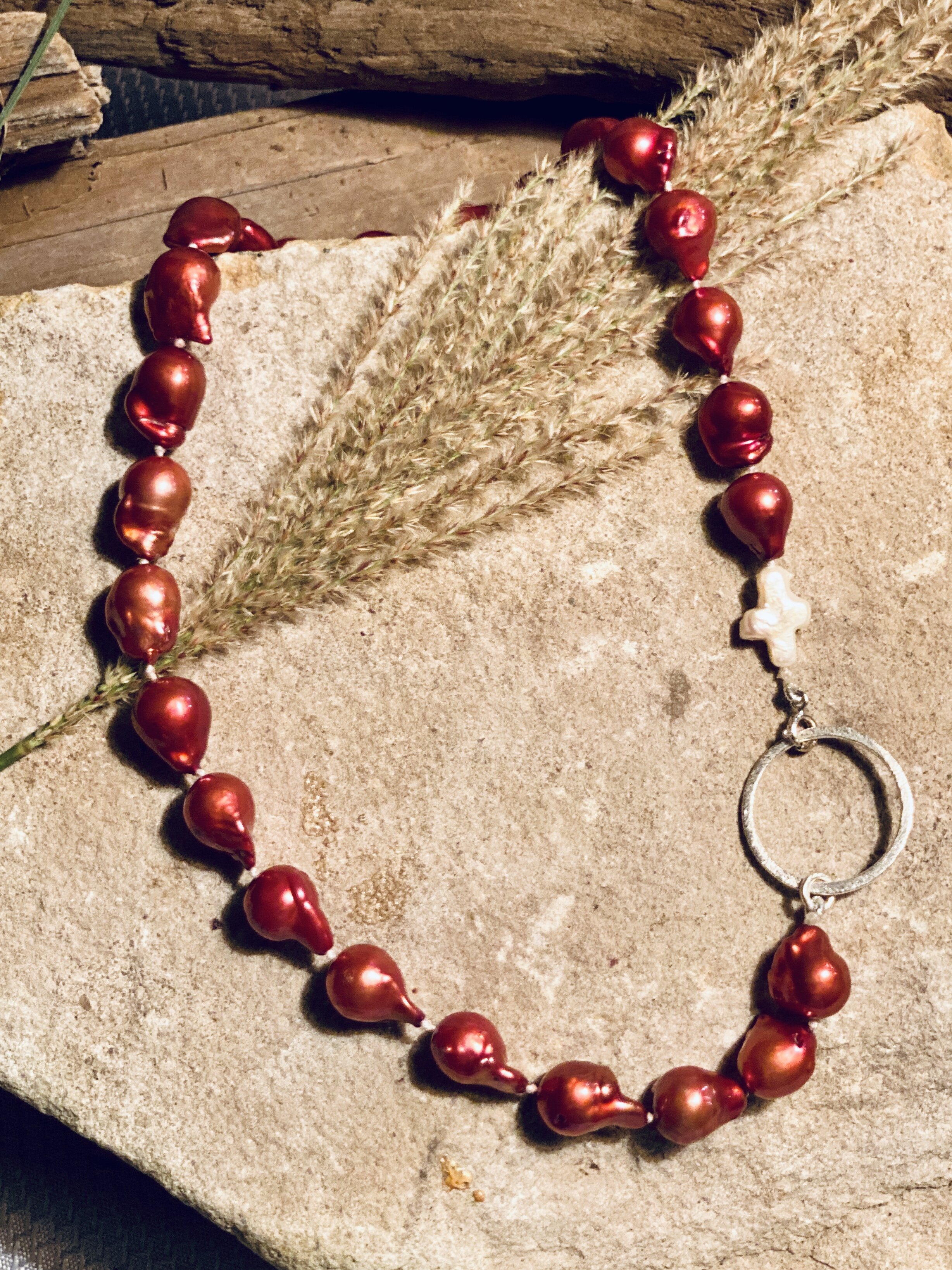 17.5” Freshwater Baroque pearl necklace with natural cross pearl accent. 