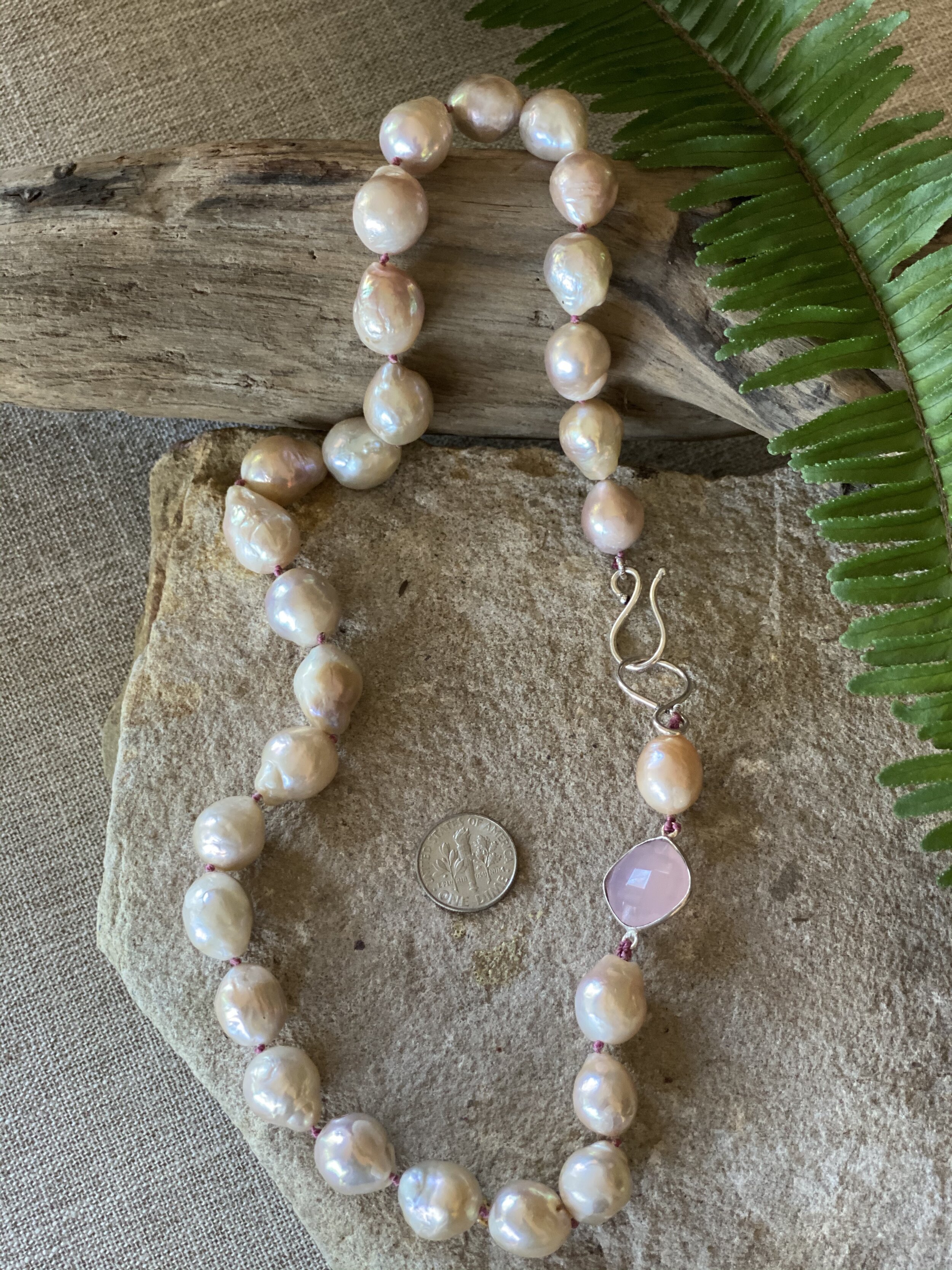20” Natural iridescent Baroque pearl necklace with pink stone accent 