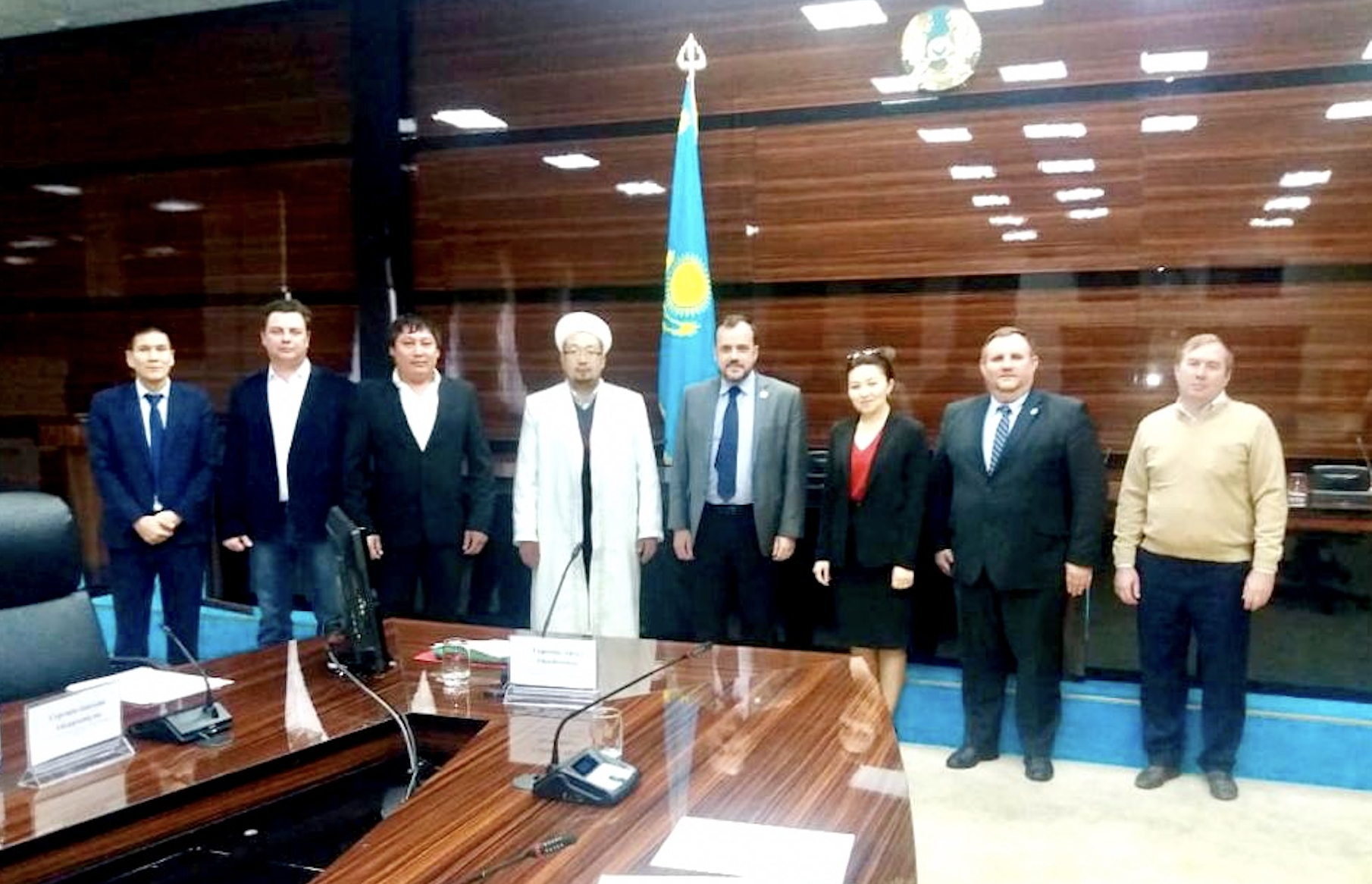 A PRE ROUNDTABLE EVENT IN SHYMKENT, KAZAKHSTAN With acute knowledge of the challenging religious climate in the city of Shymkent, Kazakhstan, LYNC successfully spearheaded the first multi-faith roundtable bringing together local government and religious leadership for safe space conversation. It was a substantial step toward multi-faith and government relations as reported by Mr. Kusack. The Kazakhstan Embassy in US helped LYNC to set up the meeting and invite the government officials and local imams. The government was represented by Aigul Sarseyeva, Deputy Head of the Department of Internal Policy and Head of the Department of Religious Affairs of Shymkent. There were two local imams and three evangelical pastors, president for AROK Aleksandr Klyushev and three mayor assistances. The agenda was to learn and discuss the following topics: - The history of relations between Kazakh Embassy and IRF Roundtable in Washington DC, including previous IRFR delegation visits and the conferences organized by IGE - Declaration VI Congress of the Leaders of the World and Traditional Religious with the emphasis on religious literacy and tolerance. - Possible larger roundtable with more diverse religious groups in the middle of 2019. The socially important or educational project that would include government and different religious communities would follow the roundtable. Mr. Kusack maintained a warmth and openness in the meeting and encouraged participants to do the same. One of the imams even said, “I never had any concerns regarding the Baptist church that is next to my mosque.” Ironically though, he never talks to the pastor of this church which underlined the necessity of our roundtable. As a result of the roundtable, it was decided to continue the dialogue between Muslims and Christians and find what can be done together, including with the government.