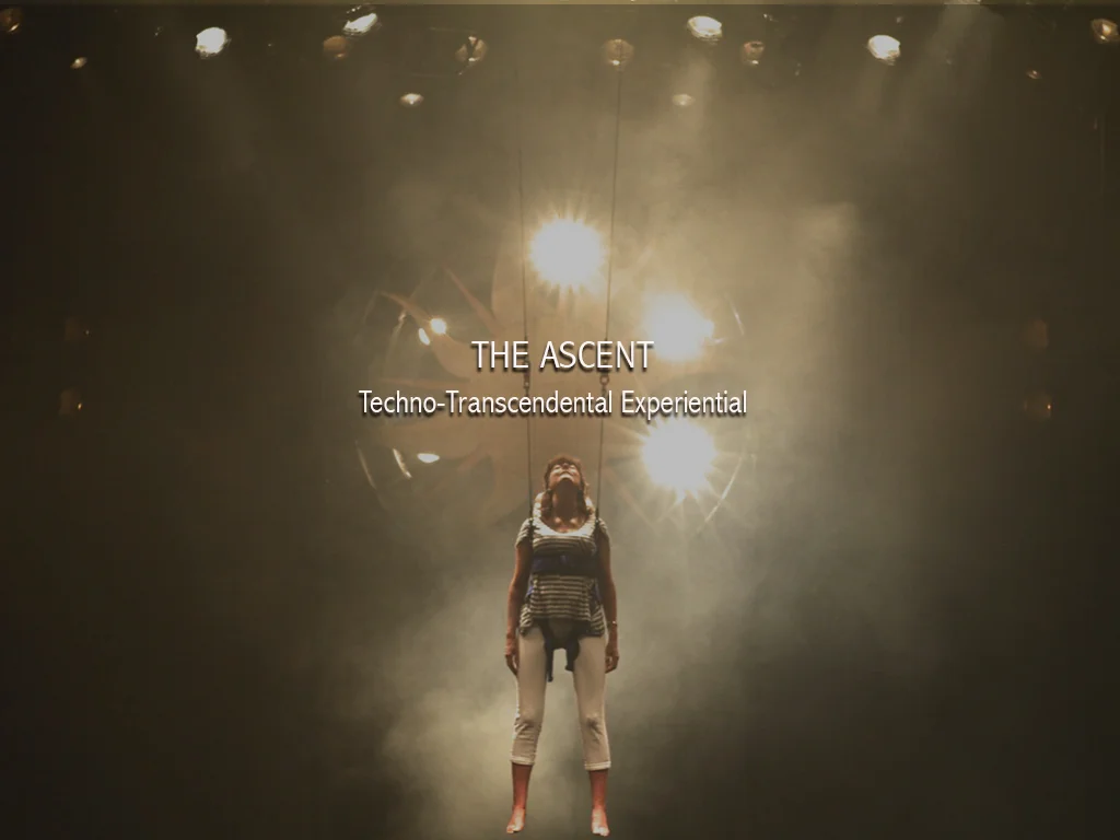 The human mind is still the most advanced piece of technology on the planet. For now. The Ascent harnesses the power of your mind and flies you through an epic display of transcendent techno-worship. Your focus and meditation literally power the experience and lift you up into the air through three levels of reactive sound and light. The Ascent uses EEG sensors, and a custom show-control system allowing your mind to lift you higher. Meditate. Levitate.