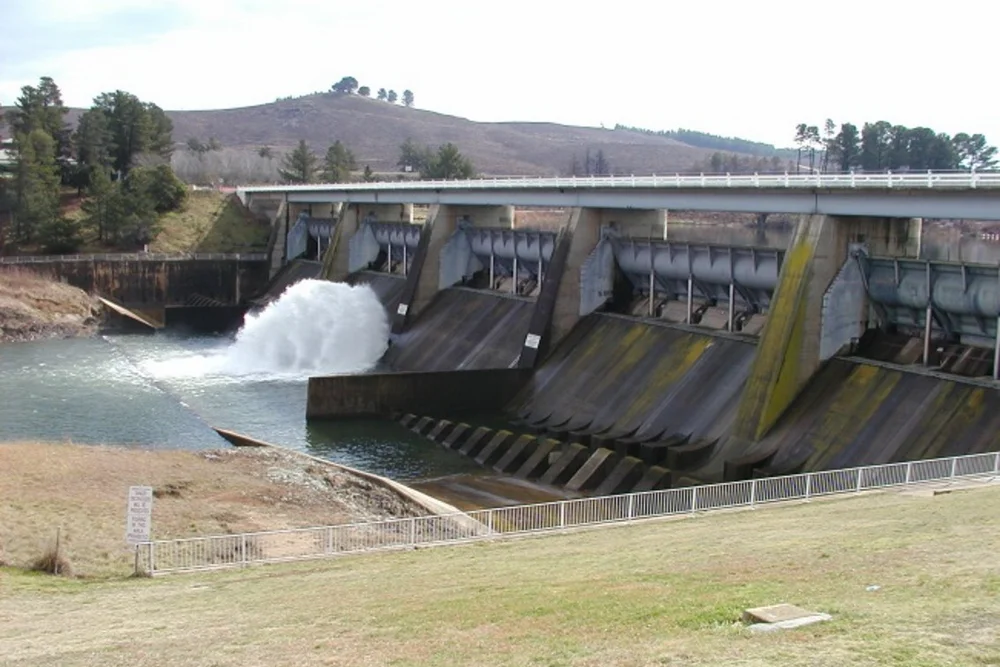 Scrivener Dam which holds back the waters of Lake Burley Griffin fed by water from the Molonglo River. Note the fish belly flaps that automatically roll open when the water level rises. This dam wall has not been breached since the Lake was filled in 1964.
