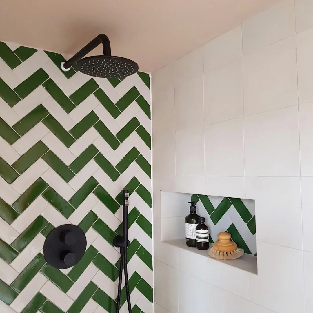 Tiles - Bert & May (the Green and White glazed Bejmat and the Brighton Stone white encaustic) Black Shower - Lusso Stone Accessories from Aesop and Arket