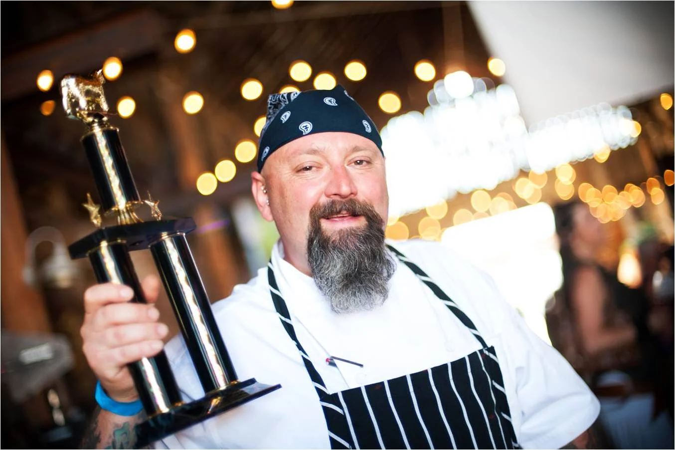 Brian Alberg- holding trophy.jpg