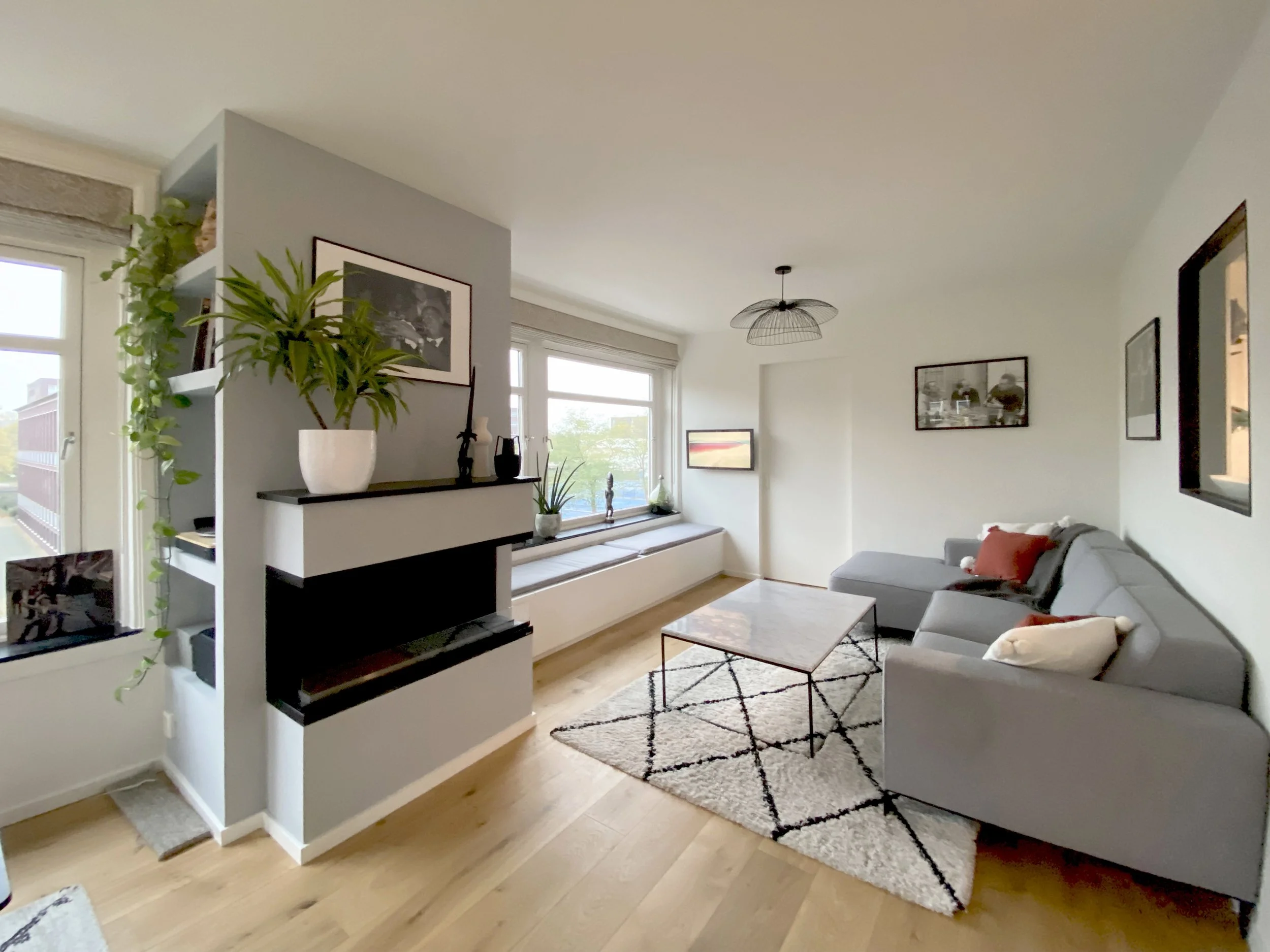  Living room corner provides space for a DJ’s corner, fireplace and built-in bench and storage 