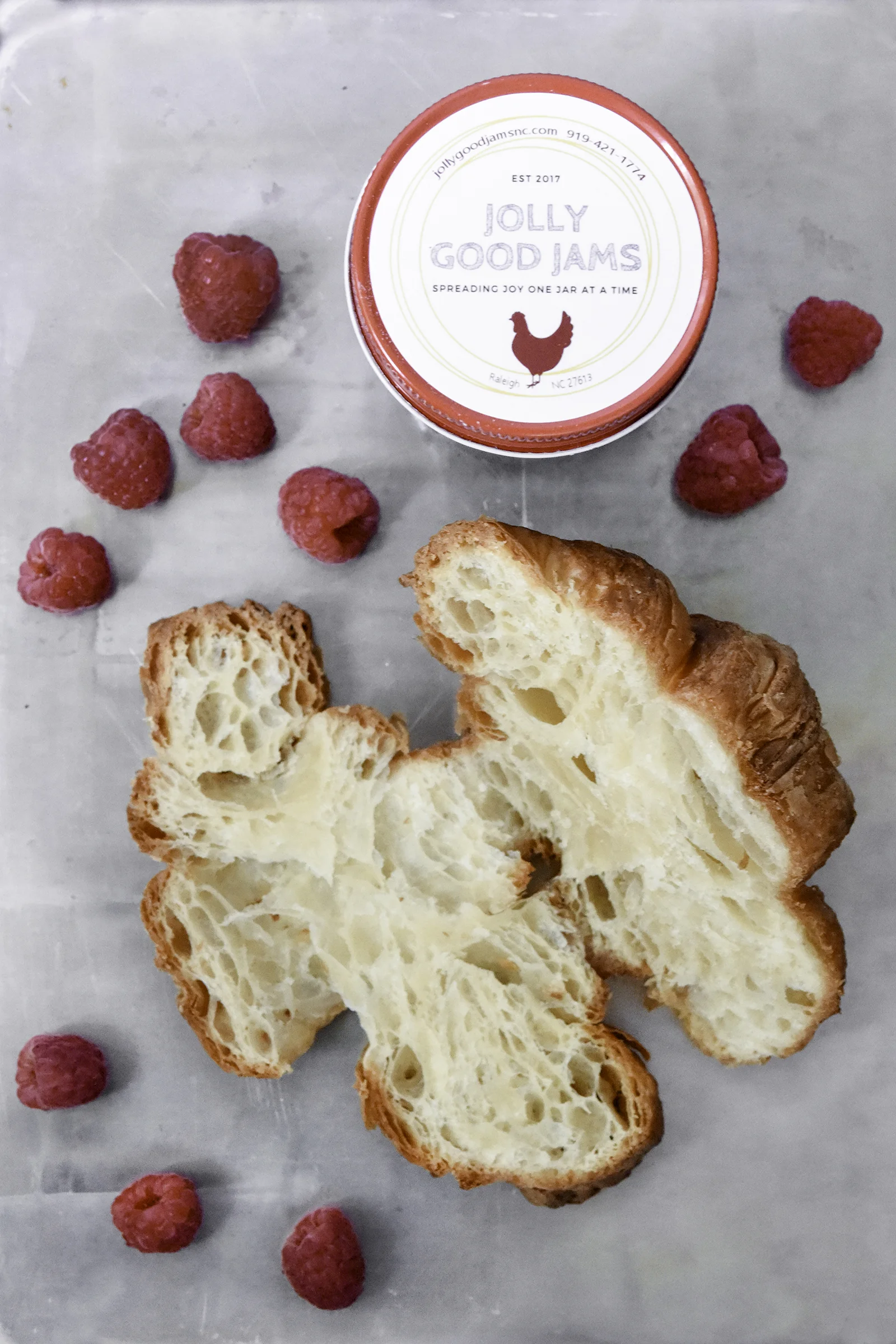 Let's throw some of that delicious jam in that super flaky croissant business.