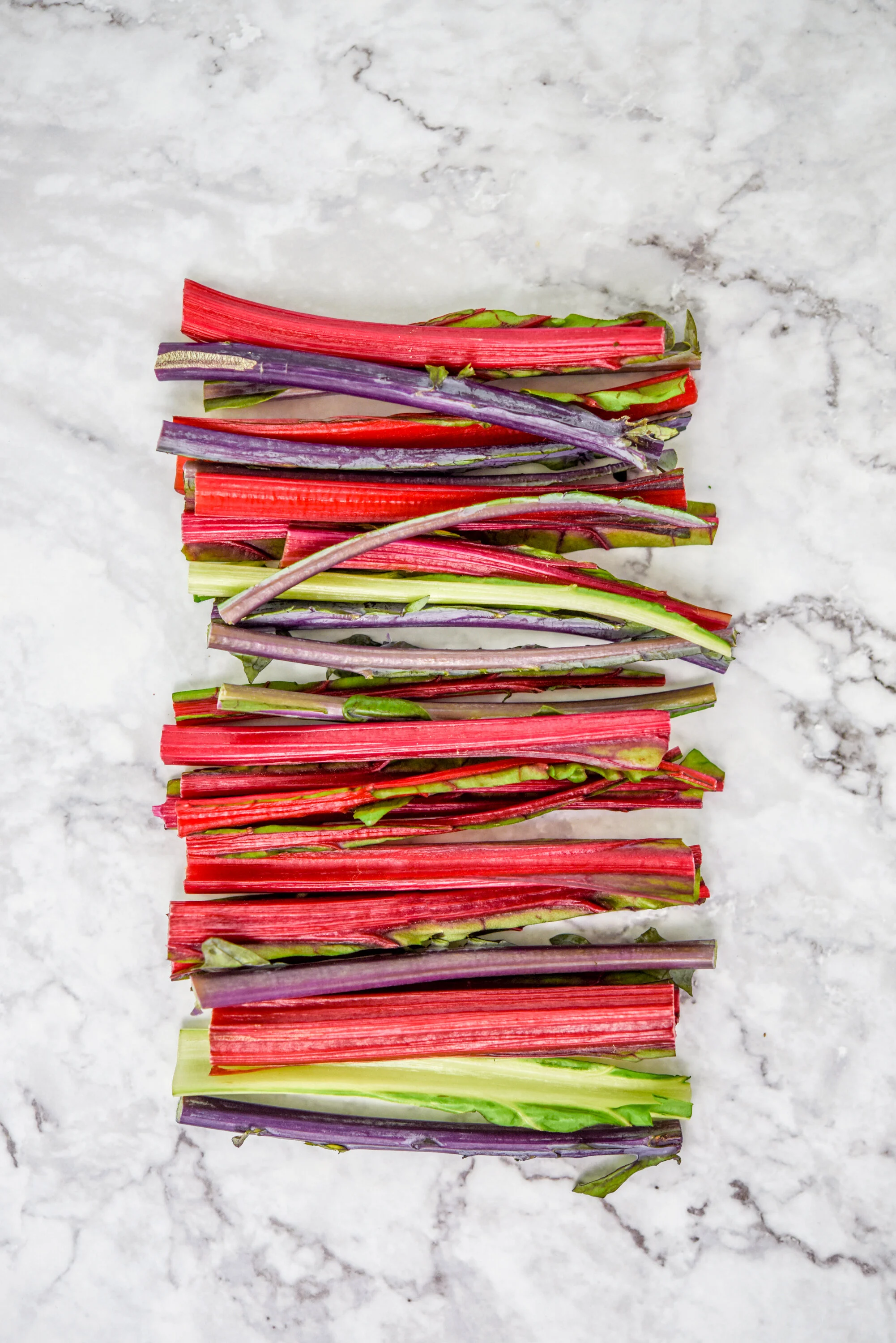 Kale and chard ribs have lots of delicious uses. One of my favorites is adding them to mirepoix. Food styling and food photography by Megan Crist.