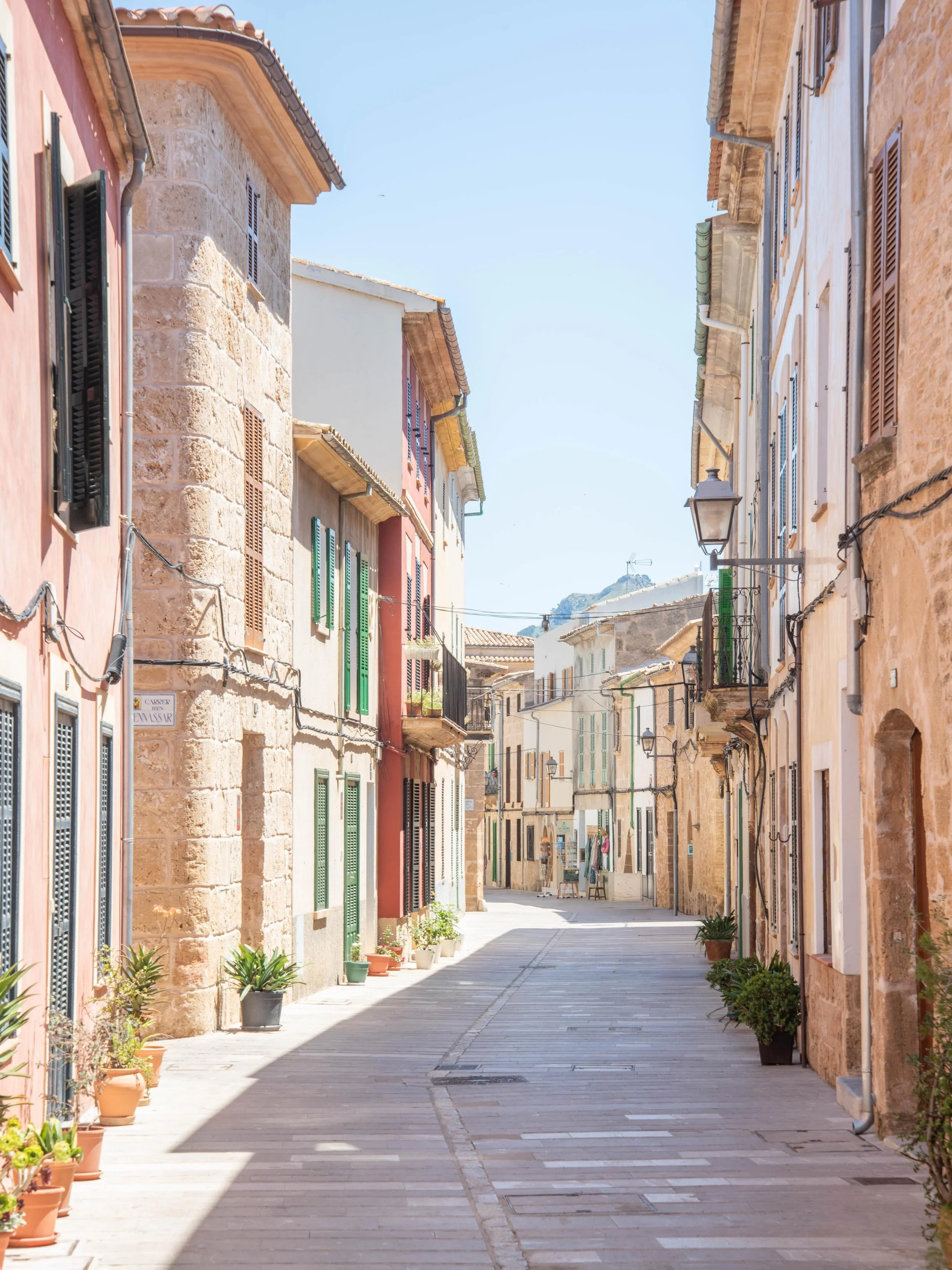 The Old Town of Alc&uacute;dia, located in the northern part of Mallorca, is a beautifully preserved historic area famous for its vibrant atmosphere, rich history, and pedestrian-friendly streets. 

Enclosed within ancient defenses, it offers visitor