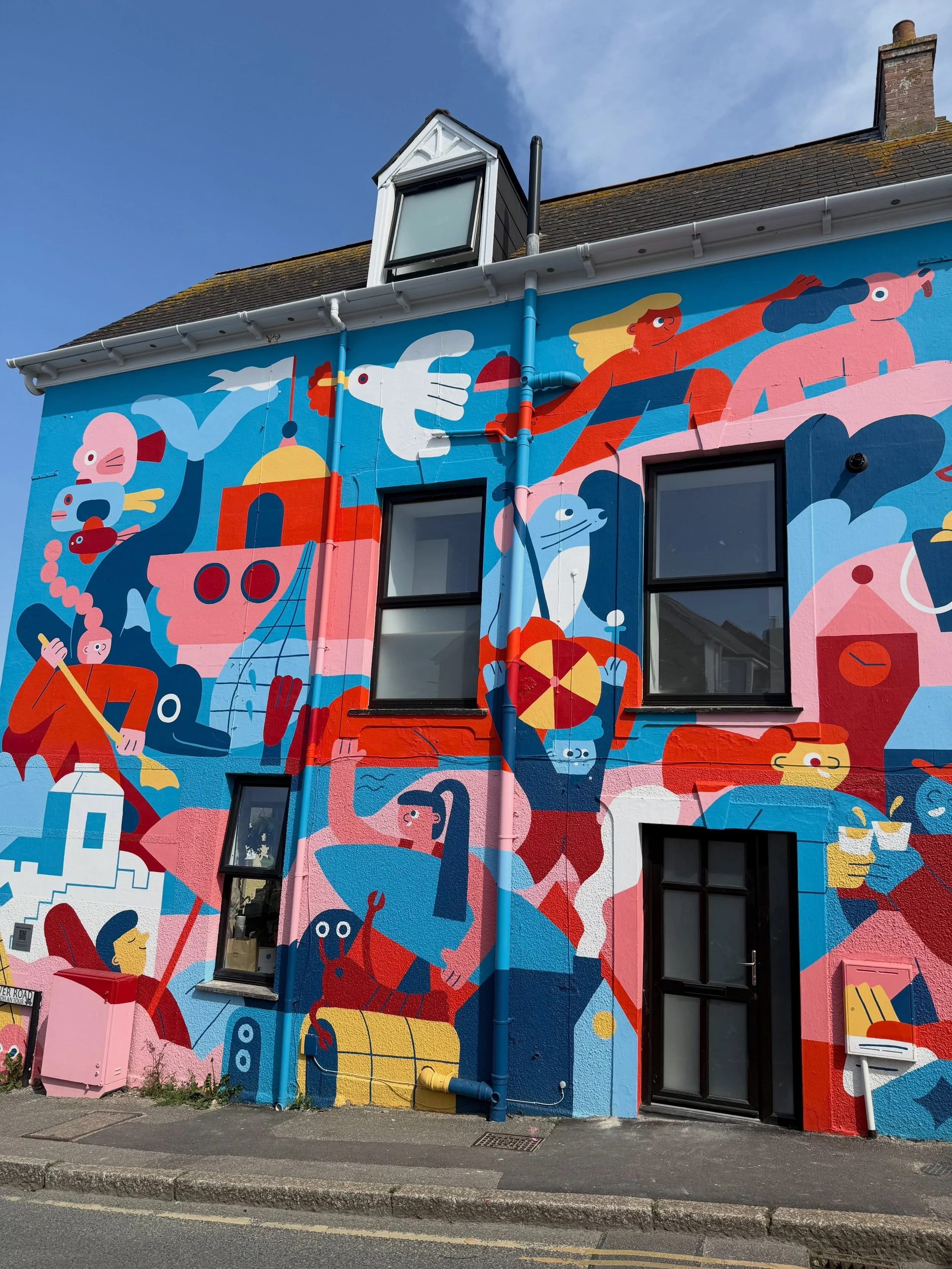 Two new colourful murals in all their full glory in Newquay.

Lauren Morsley from Scotland has painted the first shown here. Artwork on the side of the side of the former Sunset Surf at the bottom of Tower Road to showcase the town&rsquo;s vibrancy.
