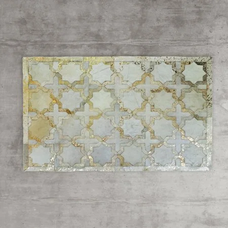 Gold Star Cowhide rug - £395.00 This gold leafed and natural leather cow hide is patch worked in an Islamic star pattern to make this beautiful Gold Star Cowhide Rug. www.grahamandgreene.co.uk