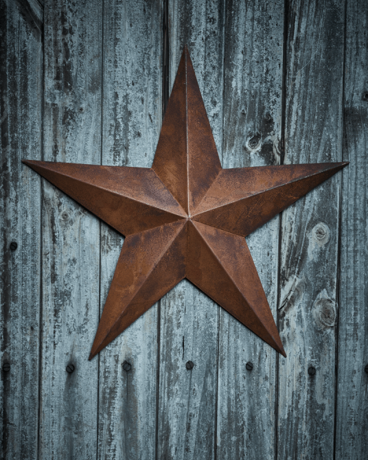 Rusty Star decoration - £20.00 Perfect for mounting on an outside wall or propping on any surface - H 49 x W 49 X D 12cm www.coxandcox.co.uk