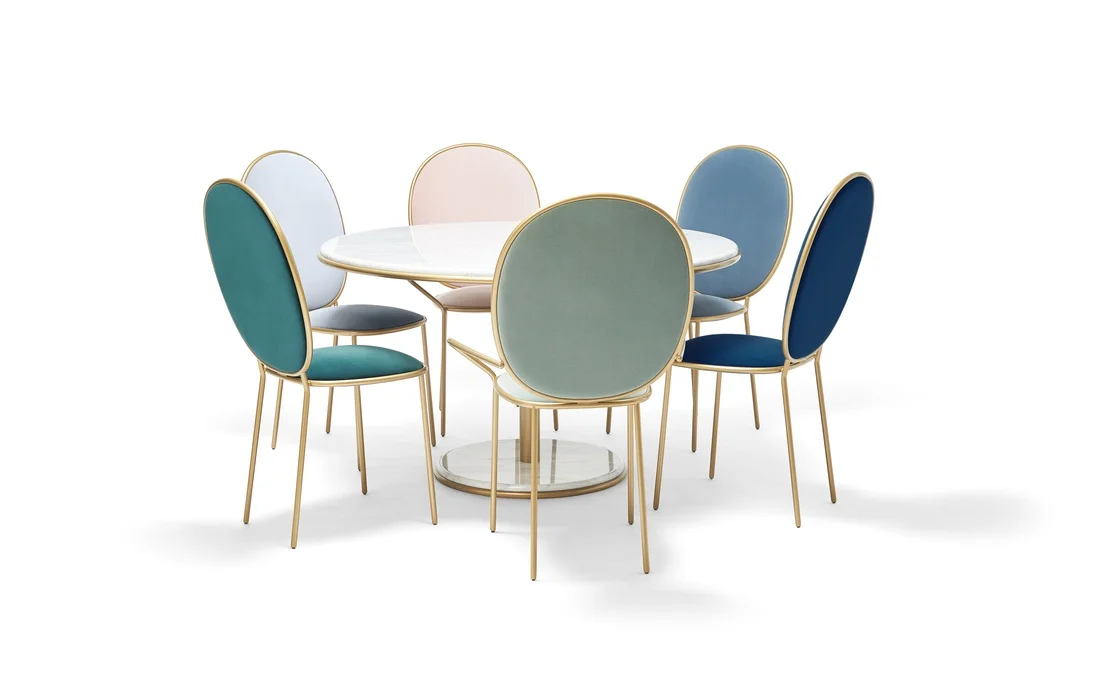 Geraldine has this Dining table and the chairs in different colours at the top of her Christmas wish list, its described as 'turning everyday seating into a special occasion' I can certainly see why!