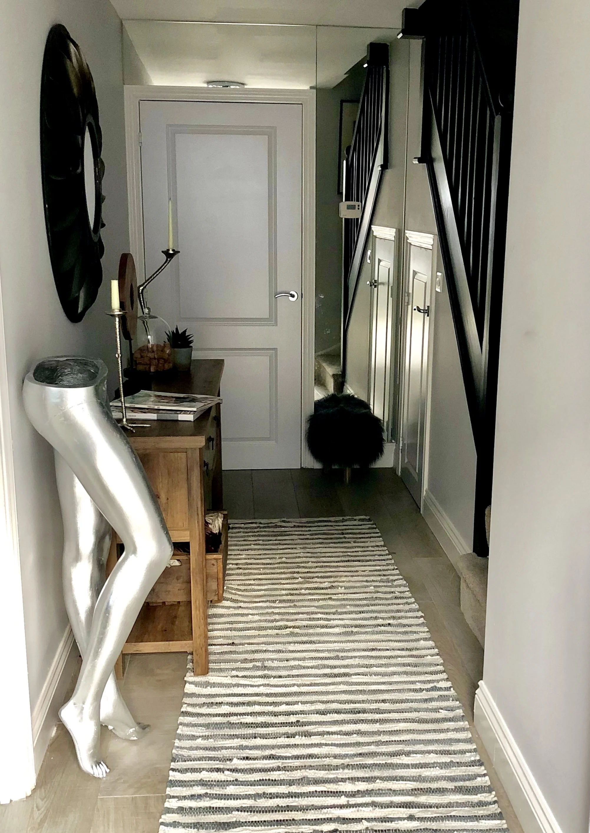 Walls- 'Polished pebble' Dulux.co.uk ...... Banister/Railings- 'Pitch Black' farrowandball.com Candlesticks- theimaginarium.co.uk..... Runner- Lilliandaph.co.uk ...... Console- Next.co.uk