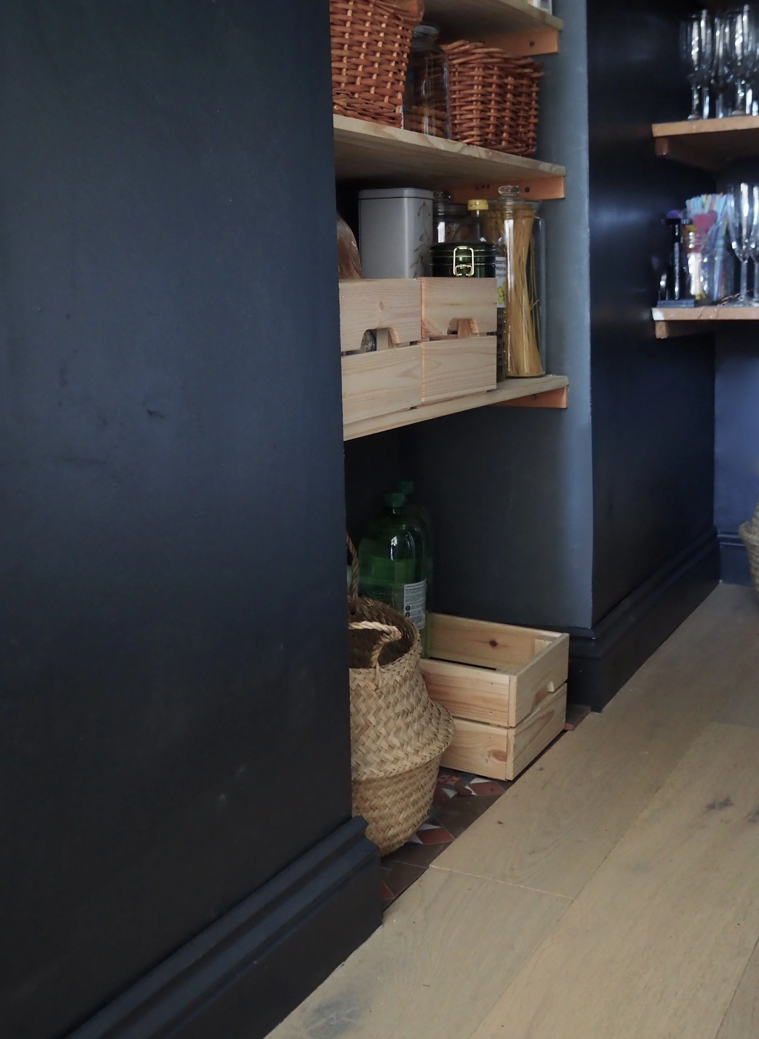 Dark walls and skirting make the walls appear taller and add impact which I love in a small room.......