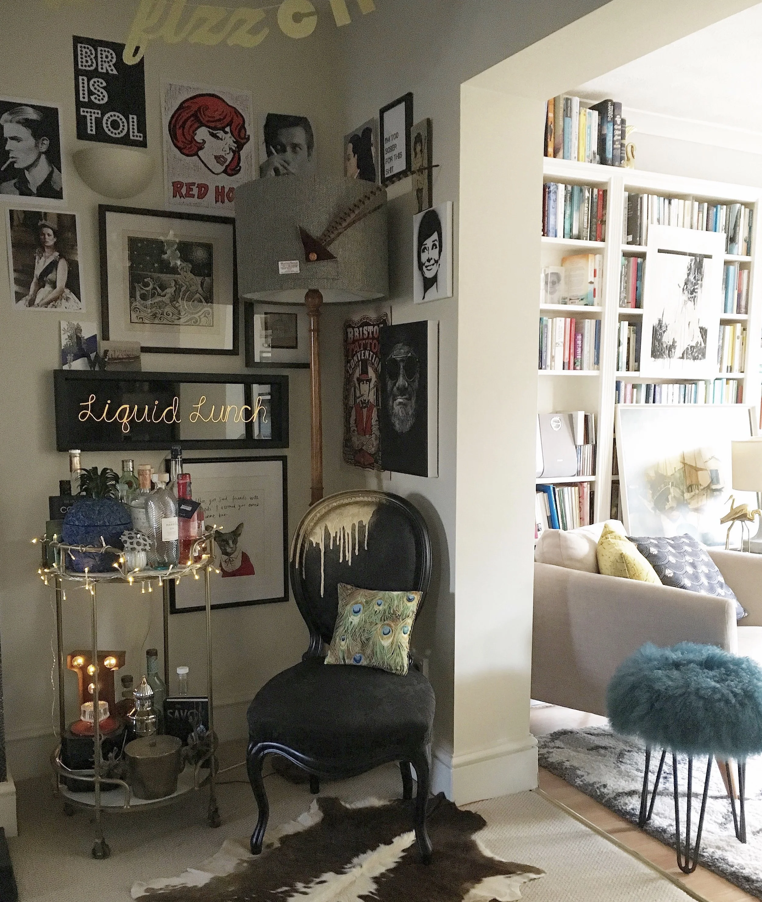 Lou's bar trolley sits perfectly in the corner of this room, I love the 'Liquid Lunch' neon, the gallery wall behind it and the splash of gold on the chair making a real feature of her home bar area...... @lou_a_watkins