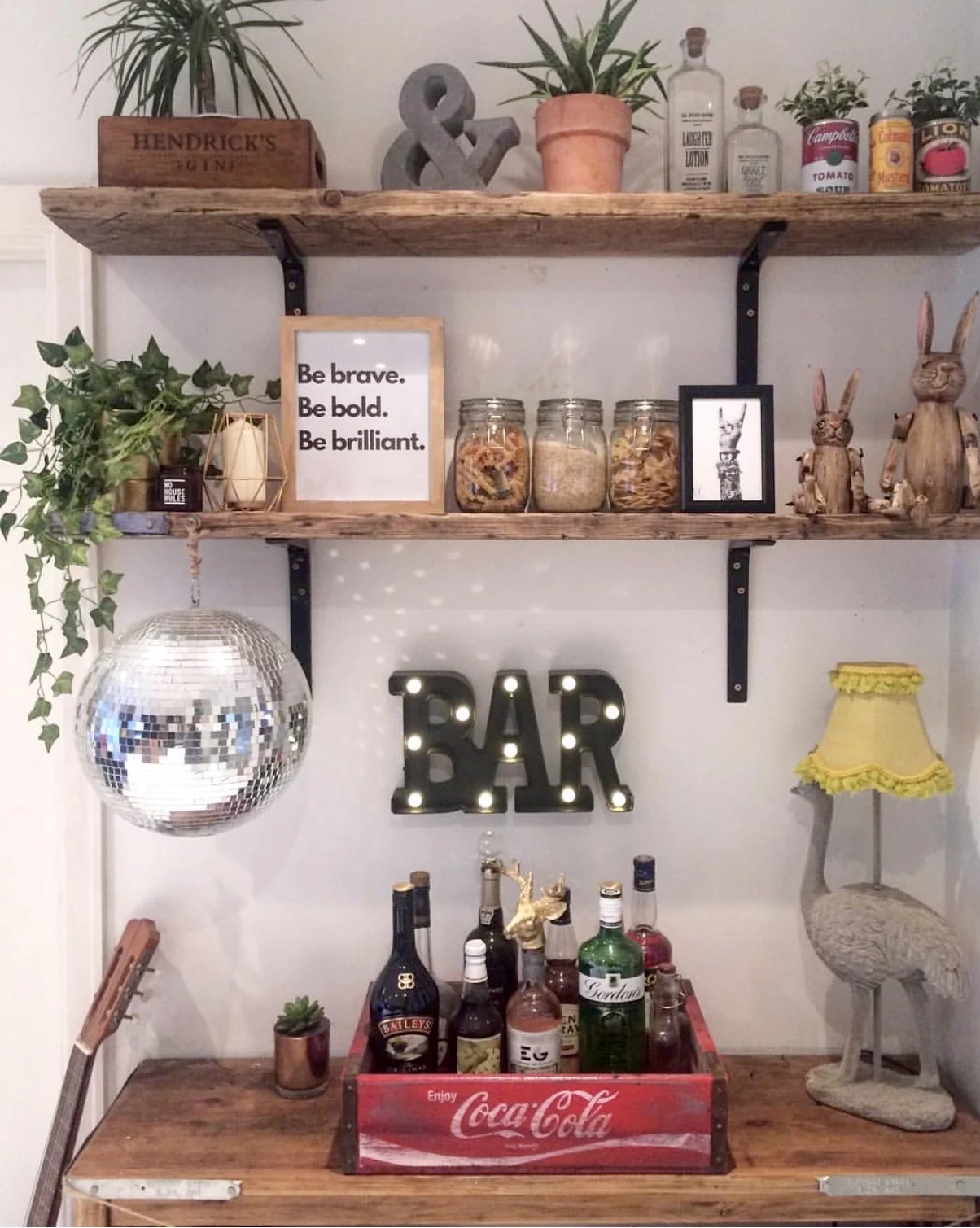 Angie has utilised a crate to make a lovely little bar area in her kitchen ......The addition of the glitter ball, bar sign and fabulously quirky emu lamp show that even in the smallest of spaces a cool home bar is achieveable! @loves_leeds_homes