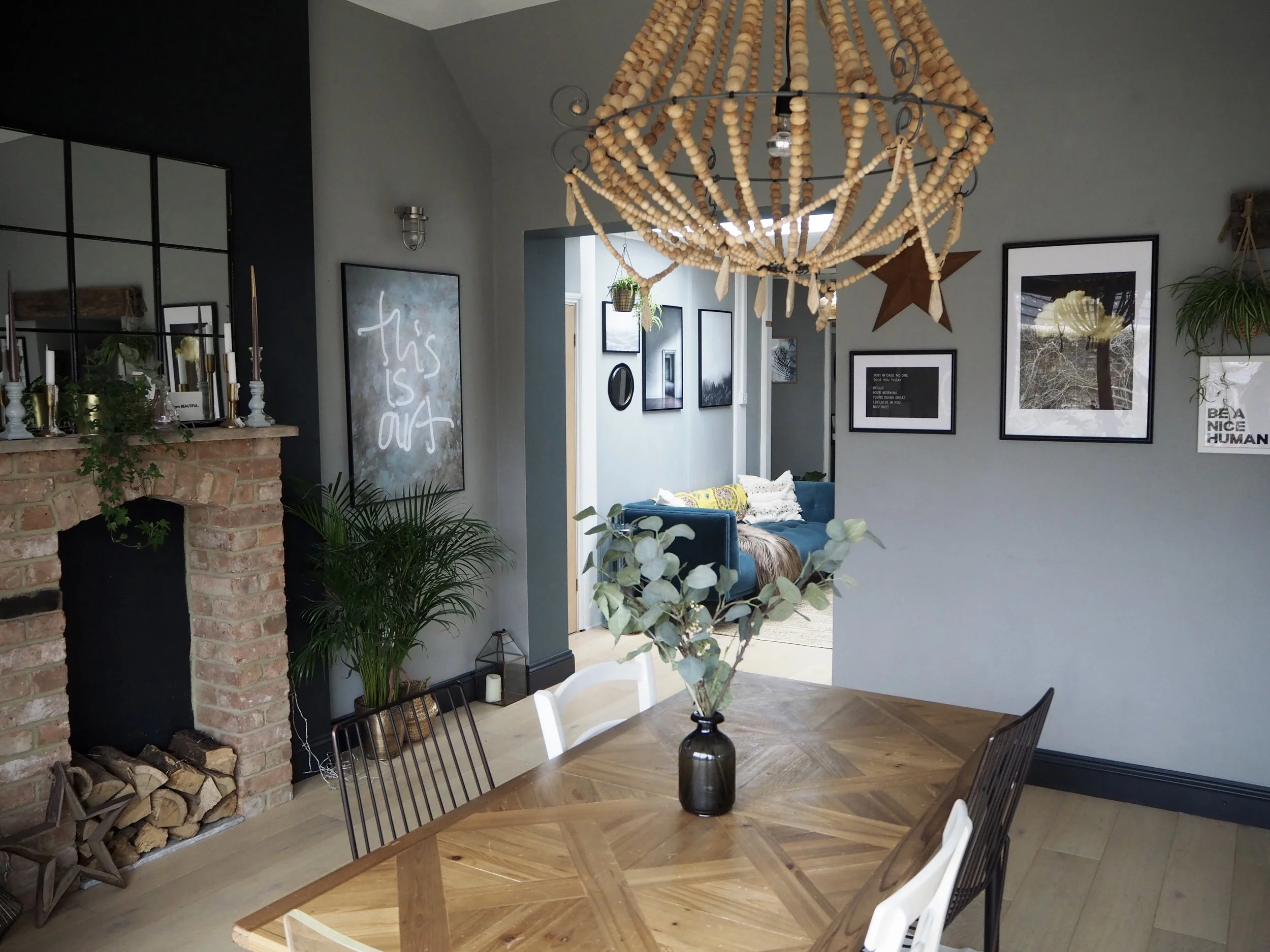 The open plan seating area from the kitchen which has the doors leading to the other rooms downstairs off it.....