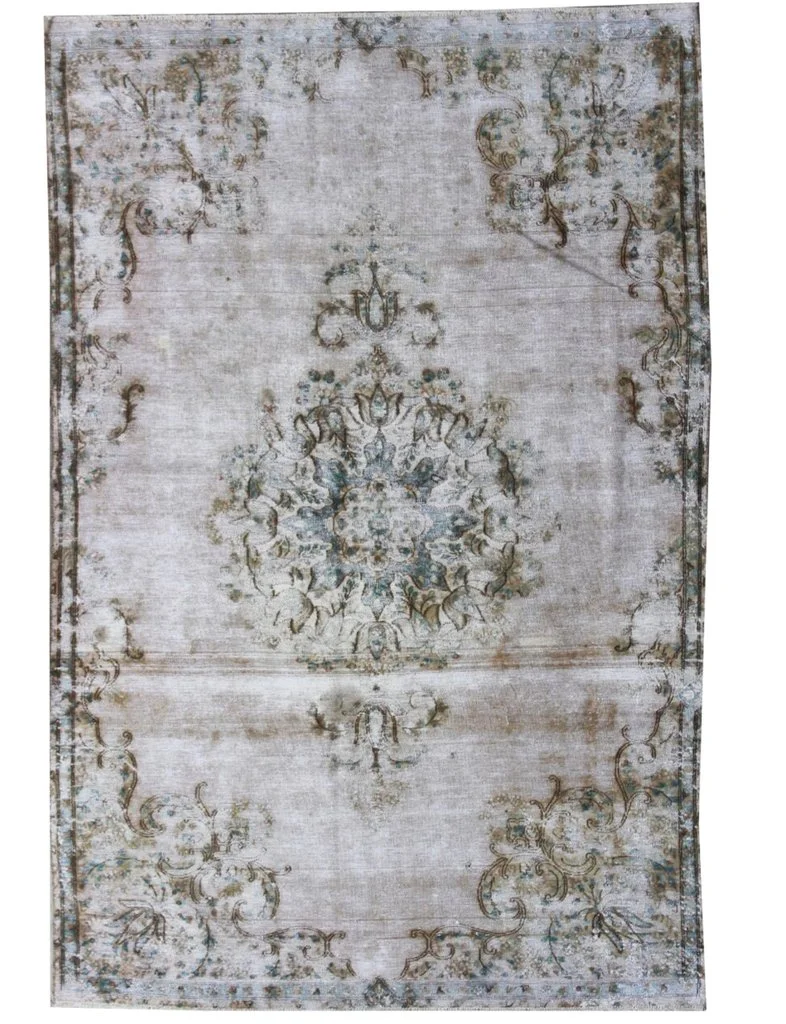 I love the muted colours in this handmade rug from The Handmade Rug Company...... One day!