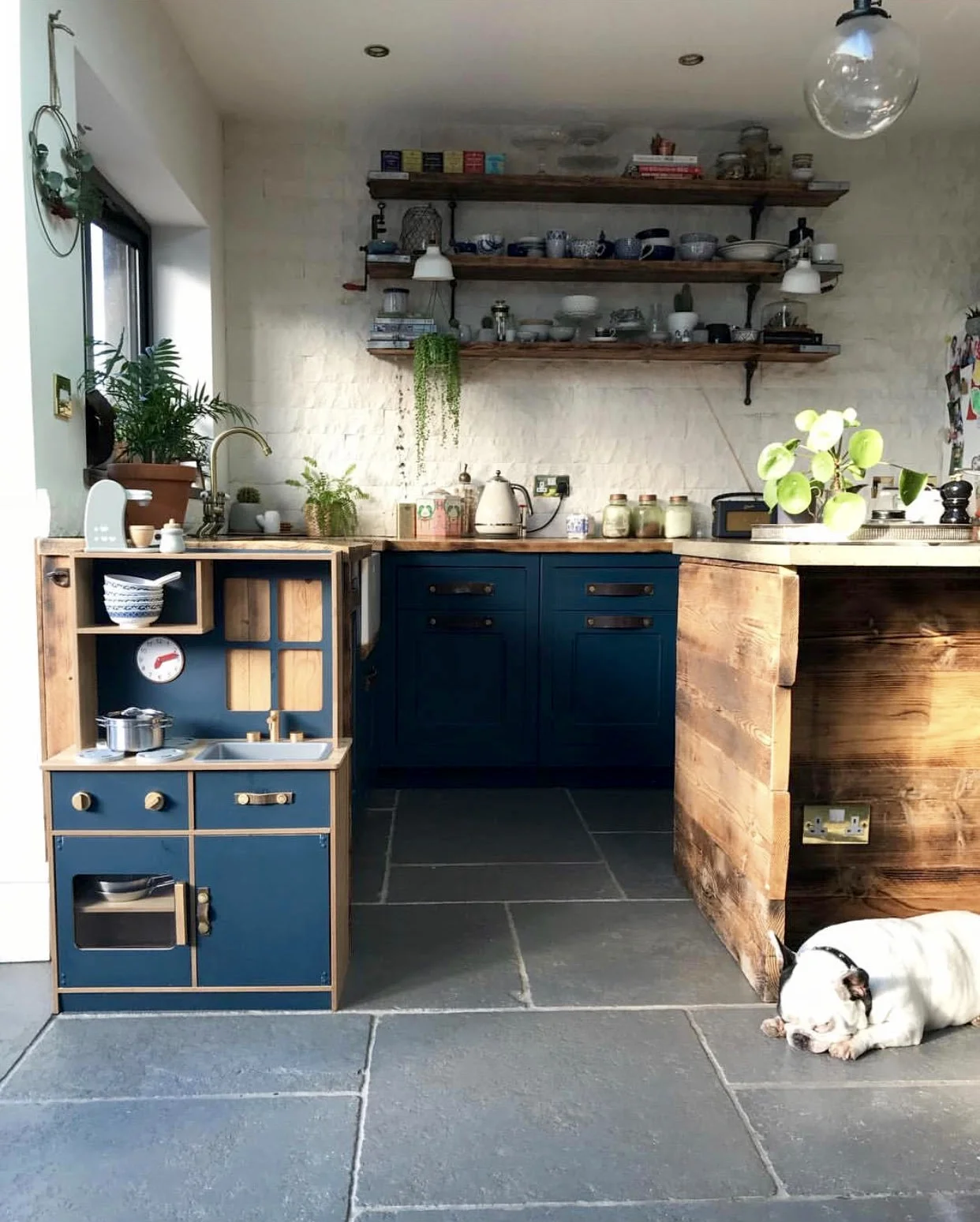 Miffy painted her daughters play kitchen the same colour as the kitchen..... The kitchen was hand built by their chippy to Miffy's specification.