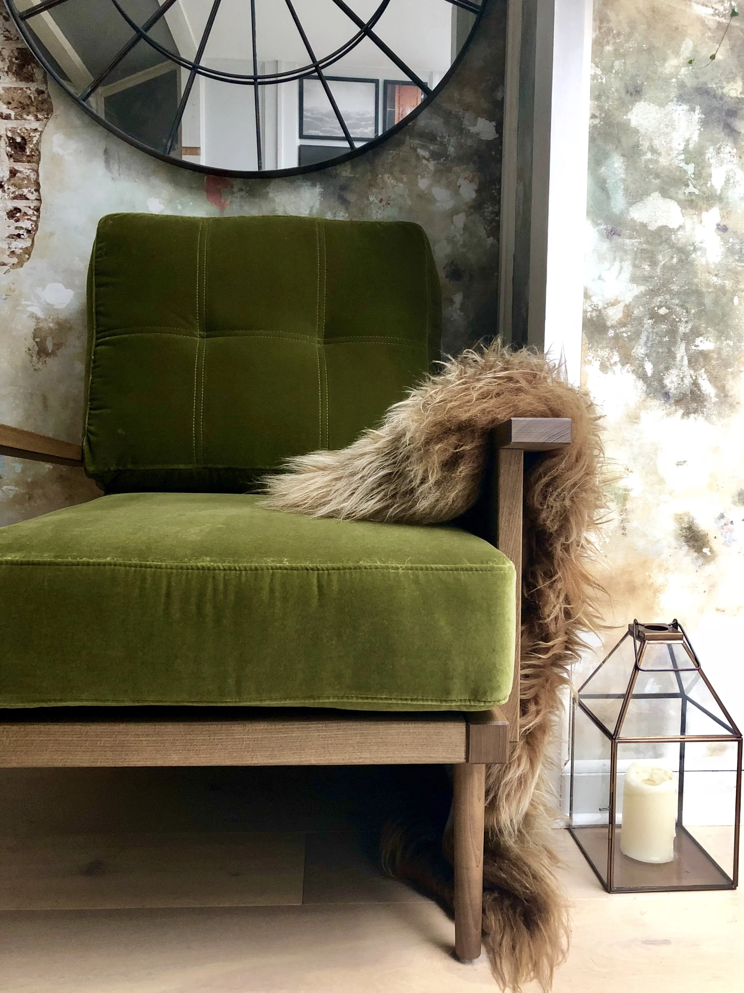 The texture and colour of this sheepskin rug work beautifully with the olive green and oak….