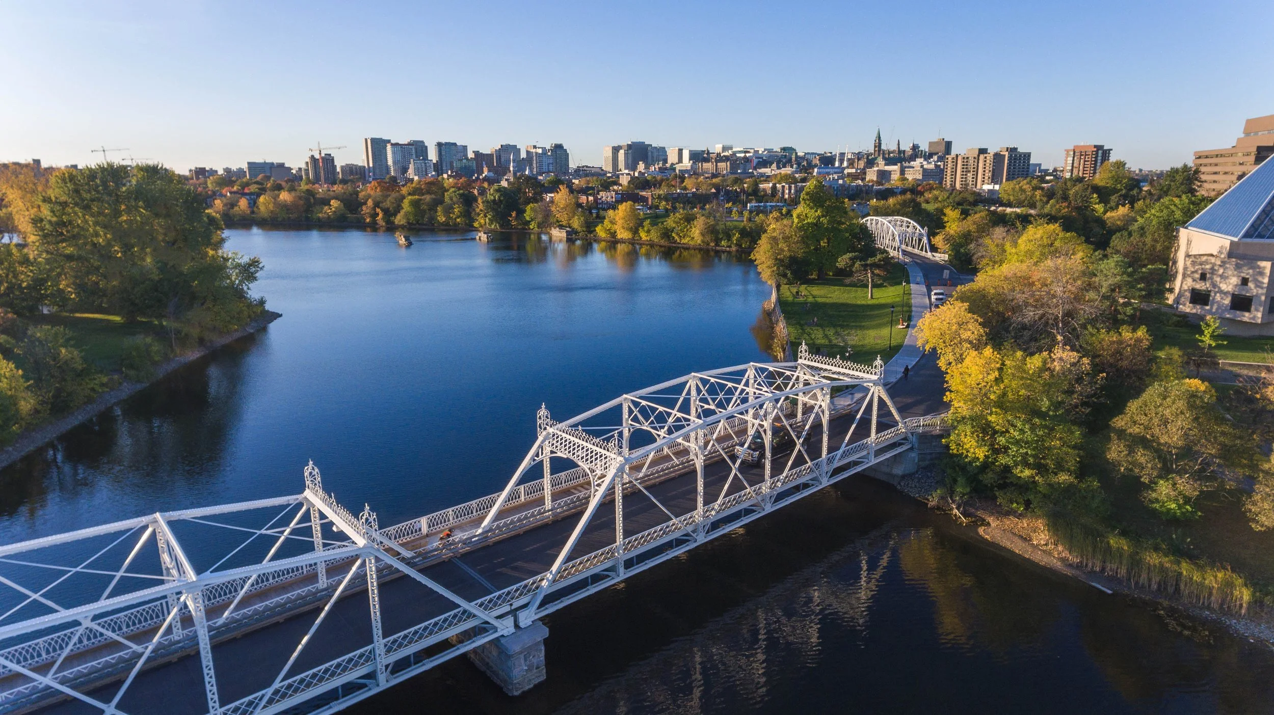 white-bridge-over-calm-lake.jpg