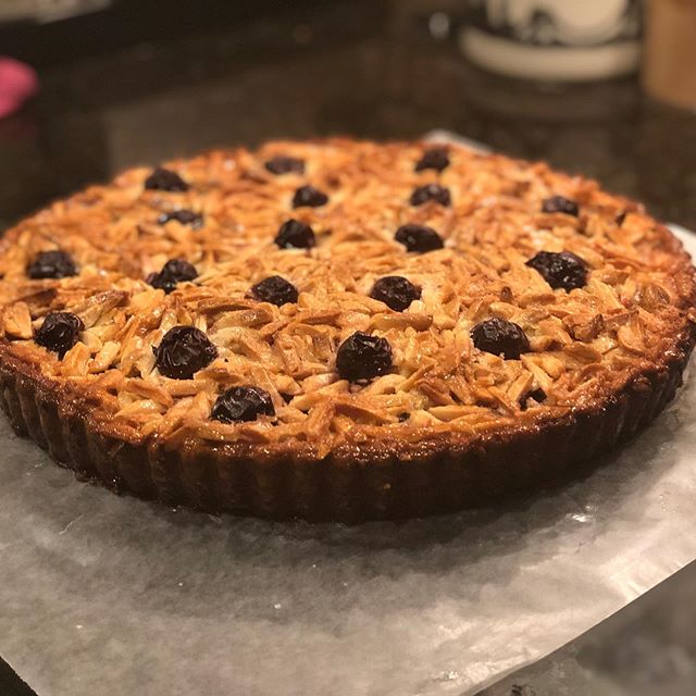 So a cherry clafoutis gets lost in Portugal...so begins the origin story of this unique sour cherry clafoutis tart, topped with an Portuguese caramelized almond top, (ala tarte de amendoa) served with whipped vanilla Creme Fraiche. Quick grab a coffe