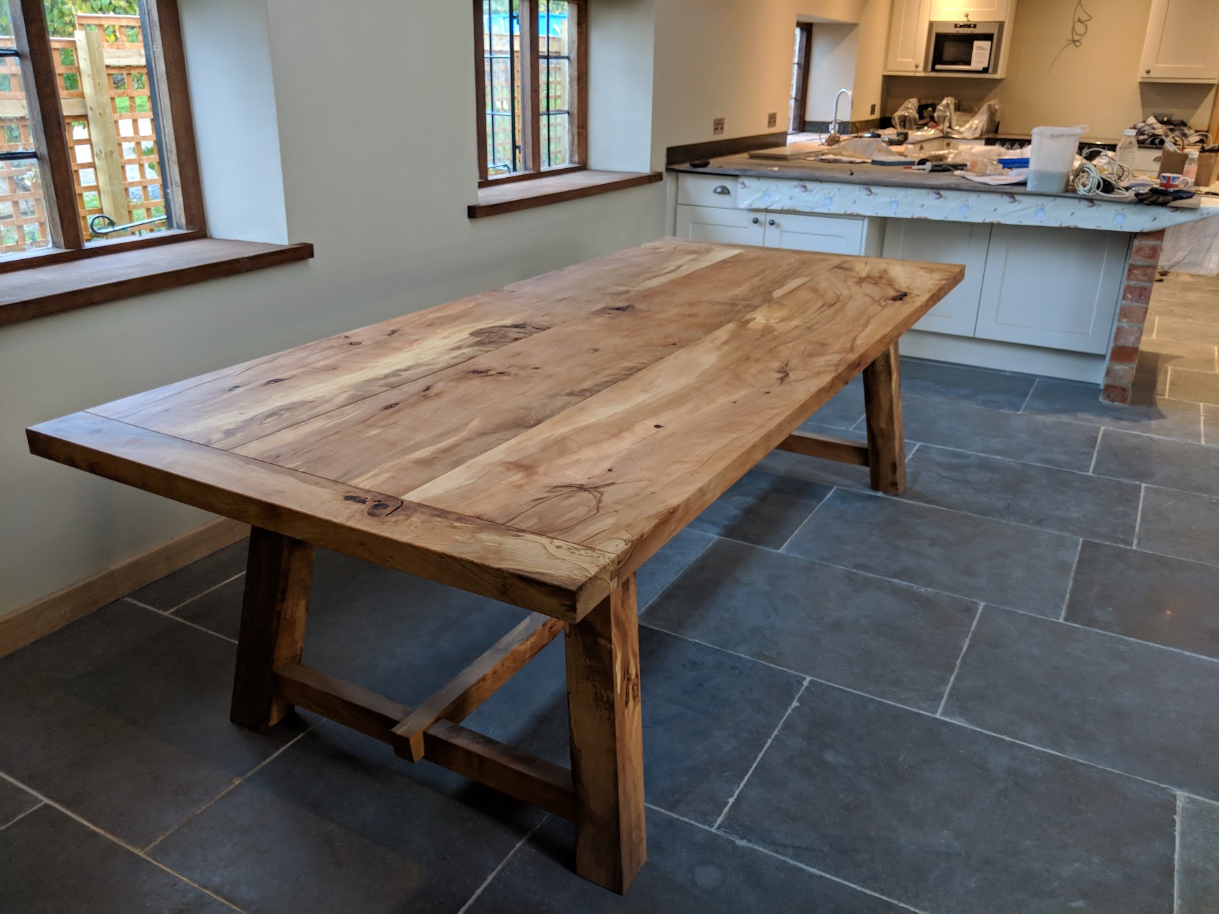 We turned the beech tree into the dining table and the stairs