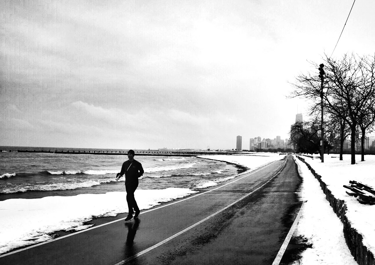Jogger on lake front trail CHICAGO IL, Jan 2016