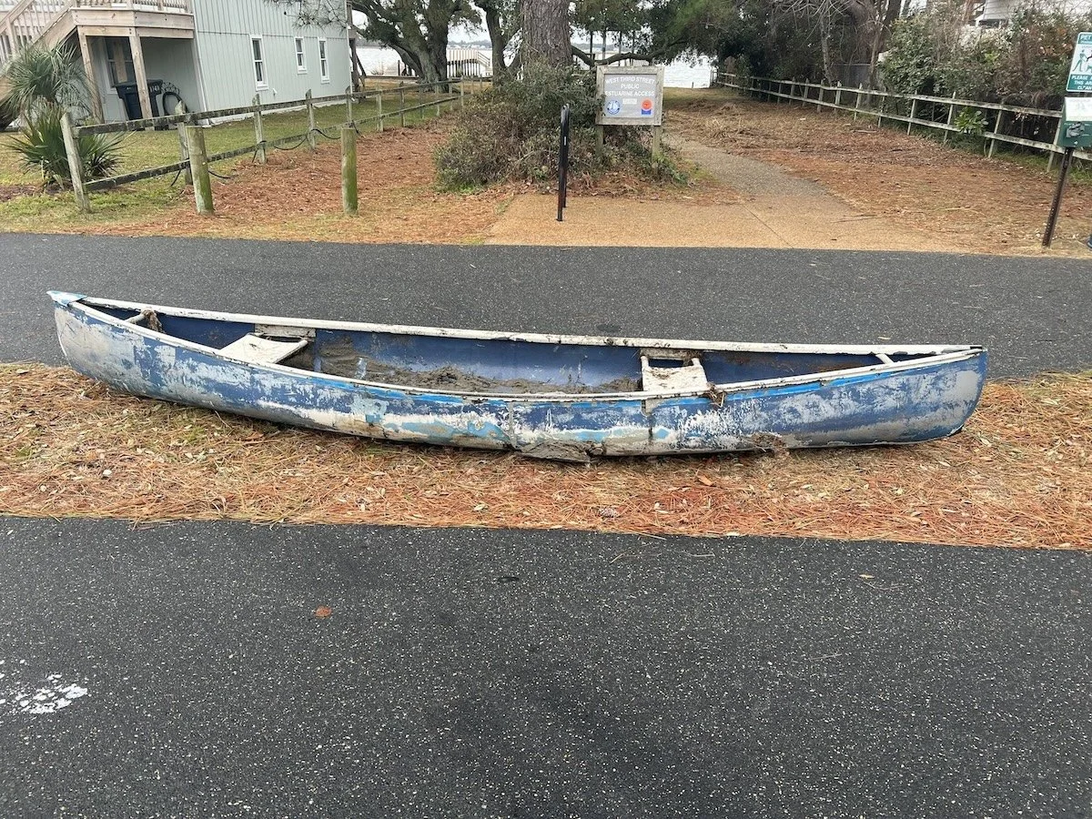  The canoe revealed during the Polar Vortex in Kitty Hawk Bay appears (based on its dilapidated condition), to have been submerged for years, its surface patinaed by lengthy exposure to a mix of salt and fresh water.  The dissection and display of th