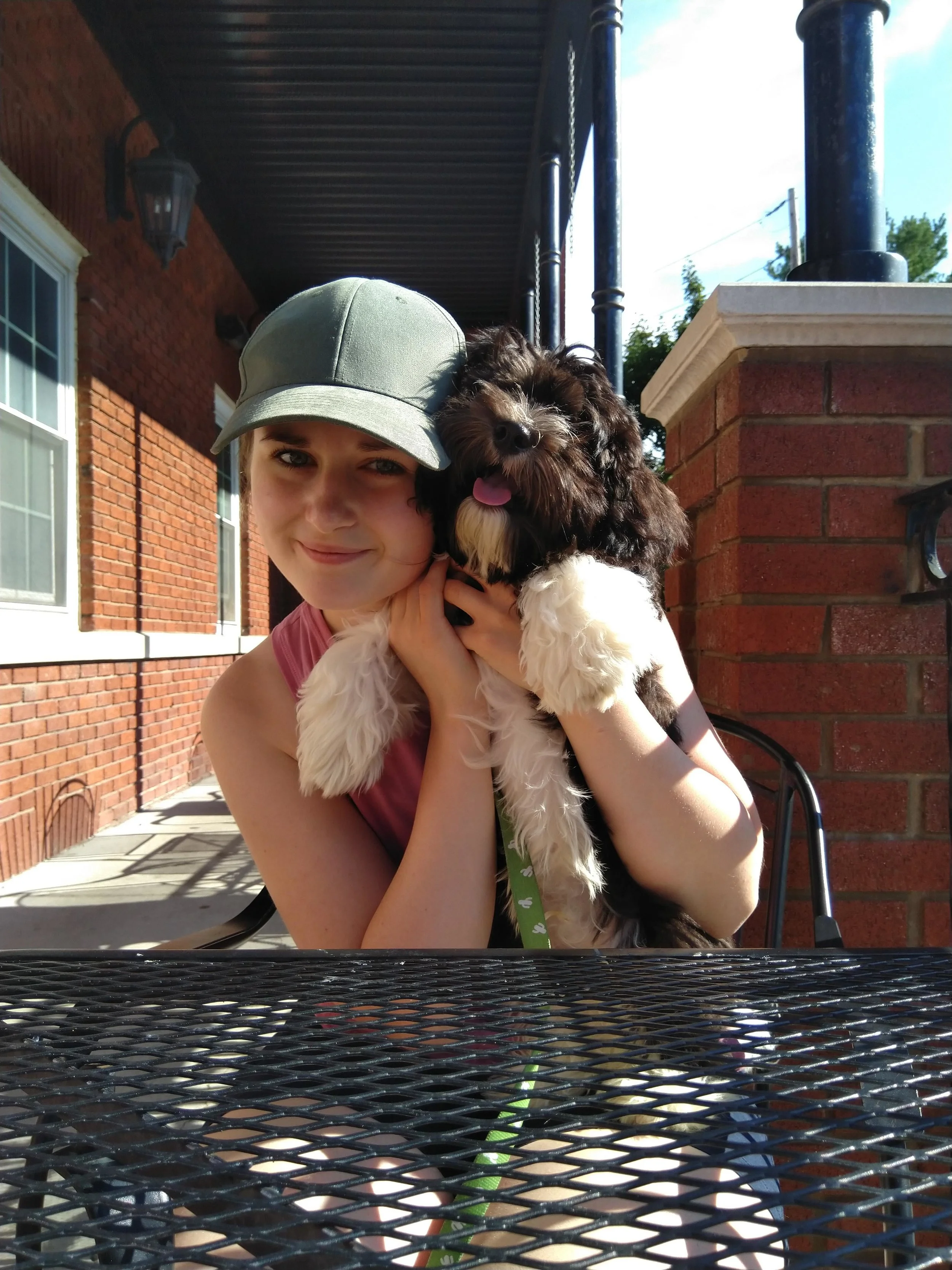 Me (Tara) and my adorable pupper-nephew.