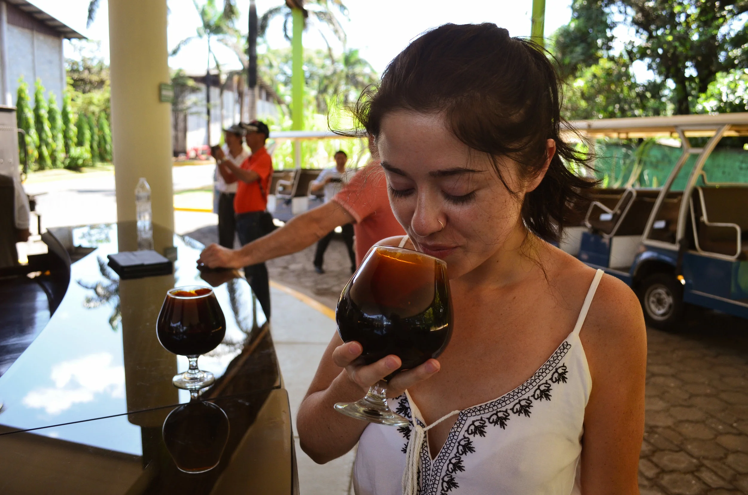 Smelling the molasses used to make Flor de Caña