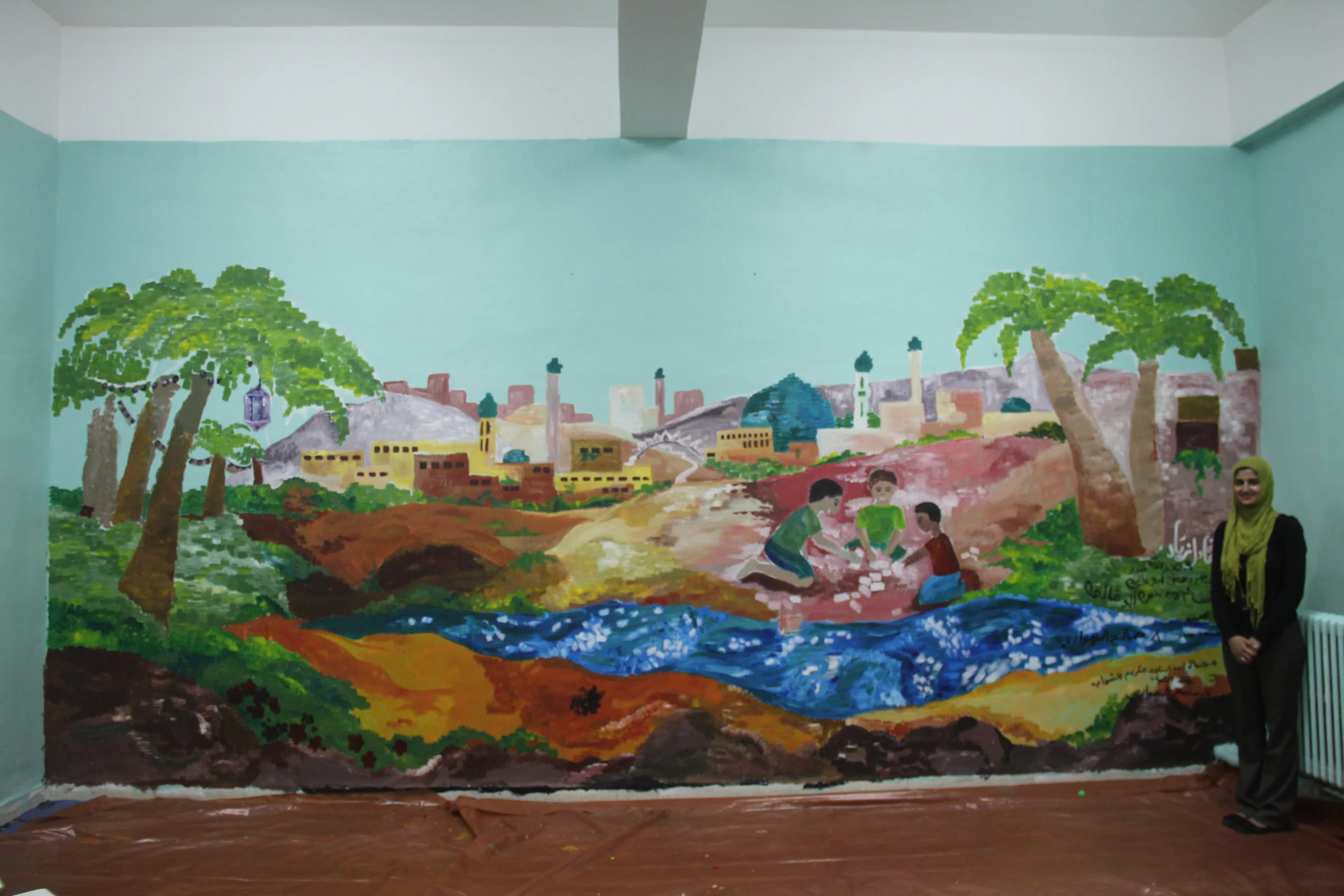  “Amman of Tomorrow,” painted with Boys of Mabarrat Umm Al Husayn in Amman, Jordan  Indoor paint on drywall, 2012, 20’x12’ 