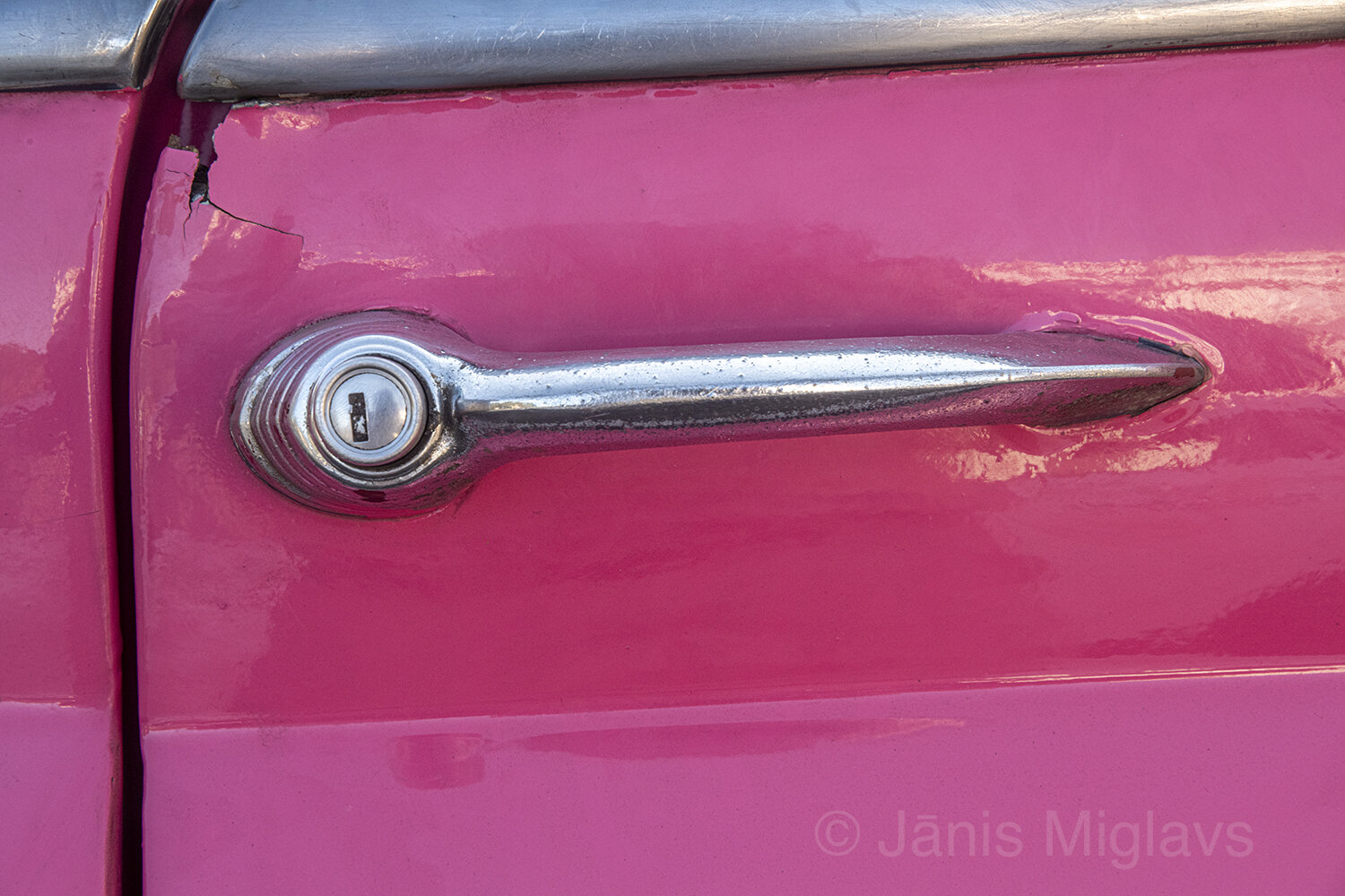 Door handle on pink