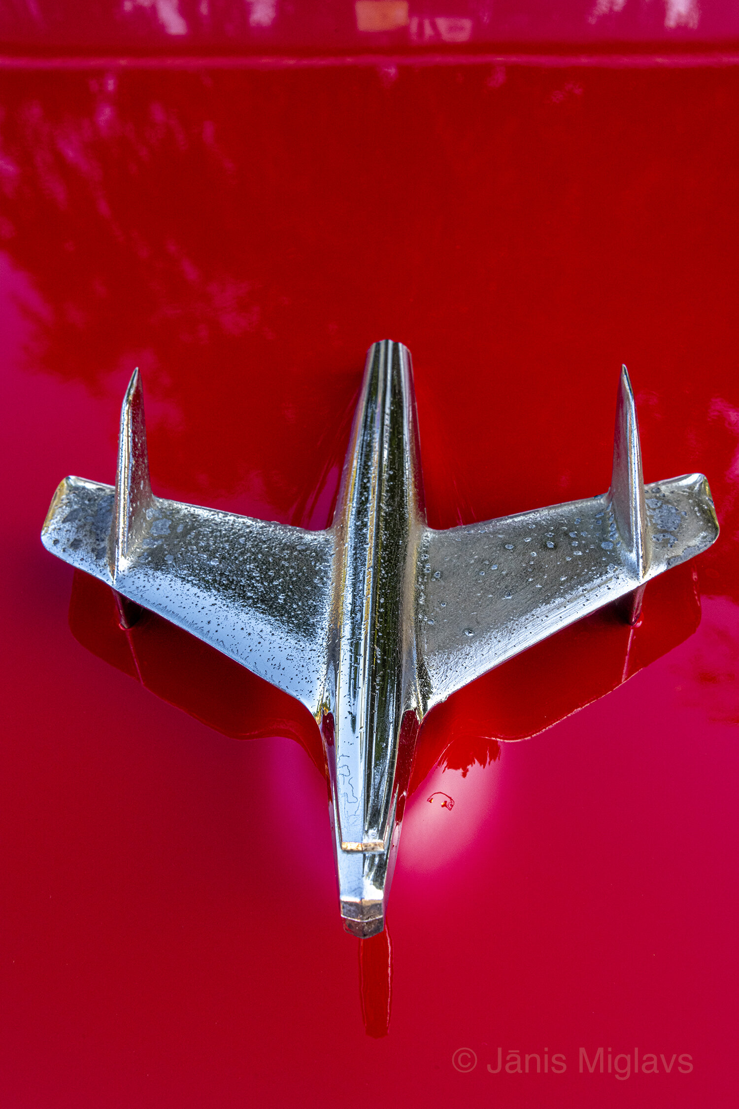 Chrome jet in red sky