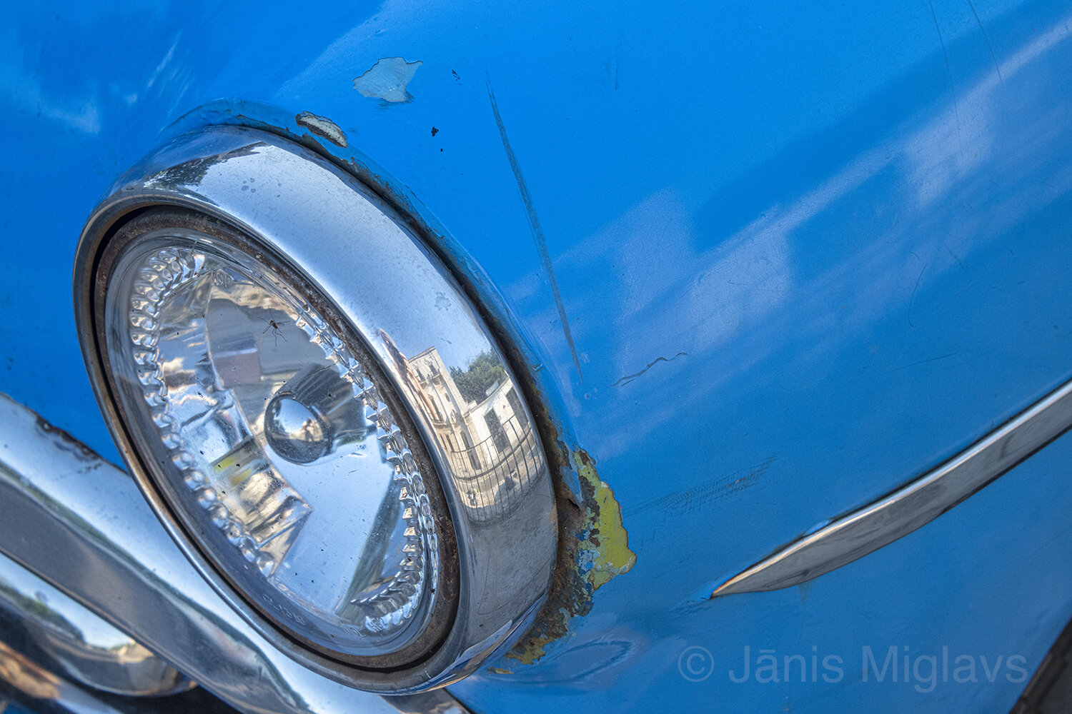 Headlight in dinged blue