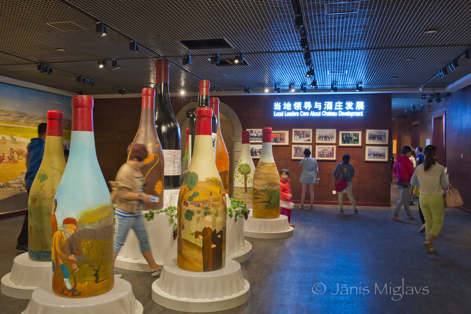 Giant hand-painted wine bottles in visitors' display at Changyu Moser XV winery.