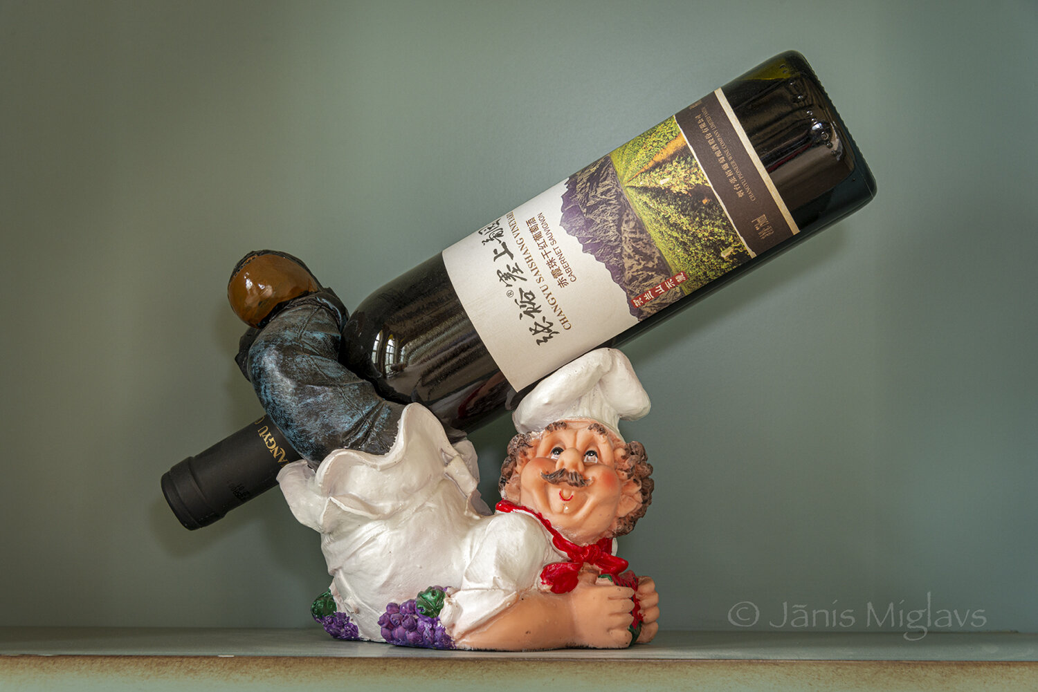 Chef charicture wine bottle holder at Chateau Changyu Moser XV, Ningxia, China.